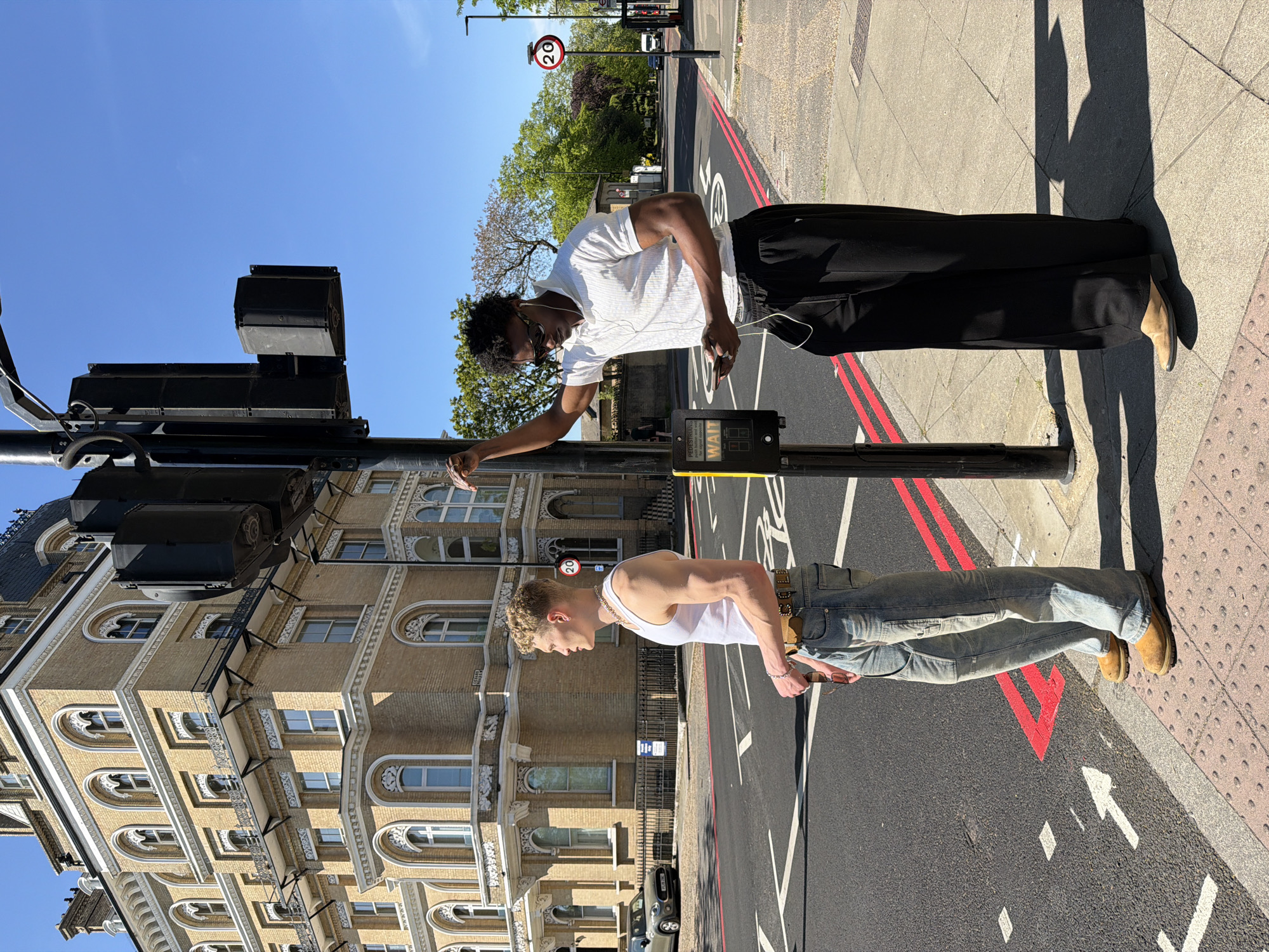 Londoners spotted using phones in parks, crossings during sunny afternoon