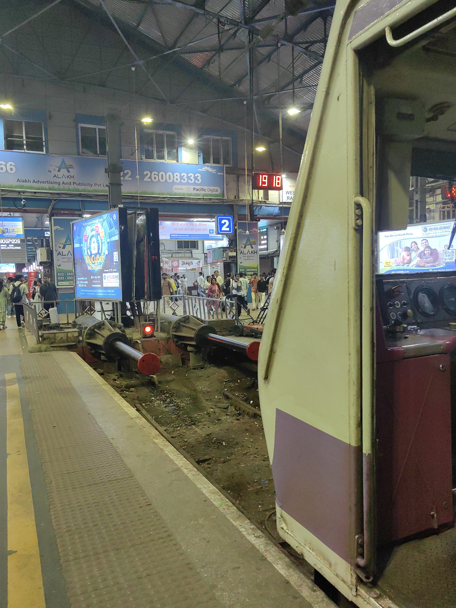 Dusk over Mumbai: railway platforms and bats taking flight