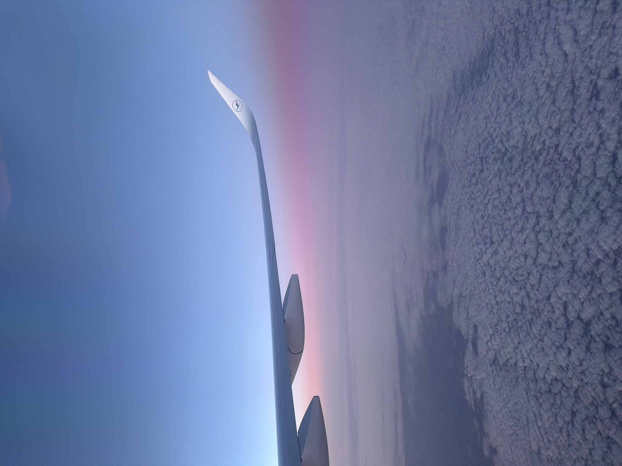 Lufthansa flight documented over Eitting Germany during sunrise hours