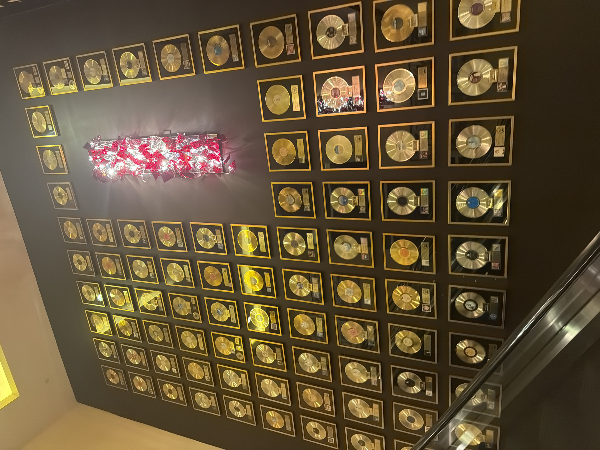 Inside Seminole Hard Rock: casino floor, waterfall atrium, and gold records