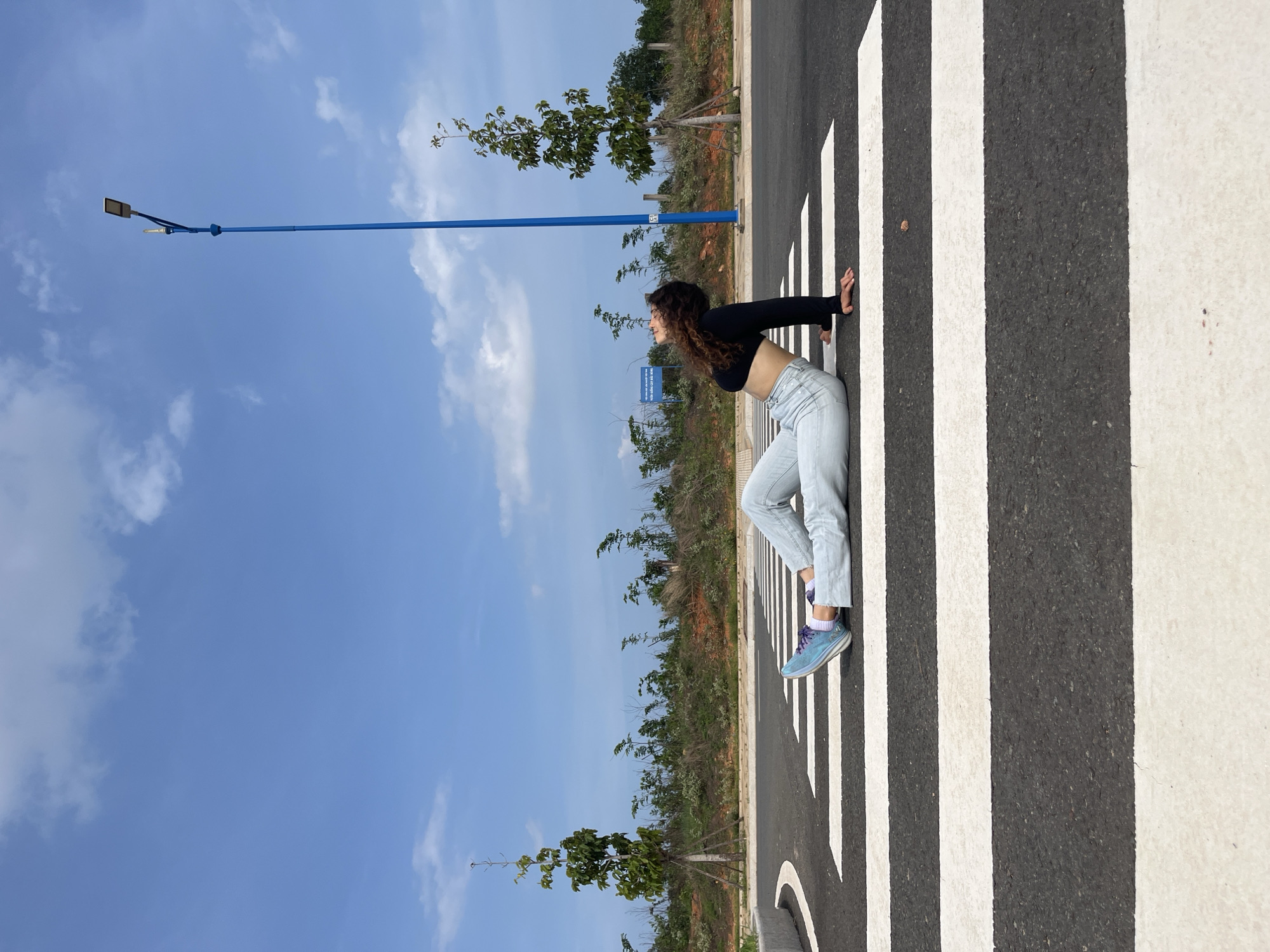 Posing on a pedestrian crossing in Mui Ne, Vietnam