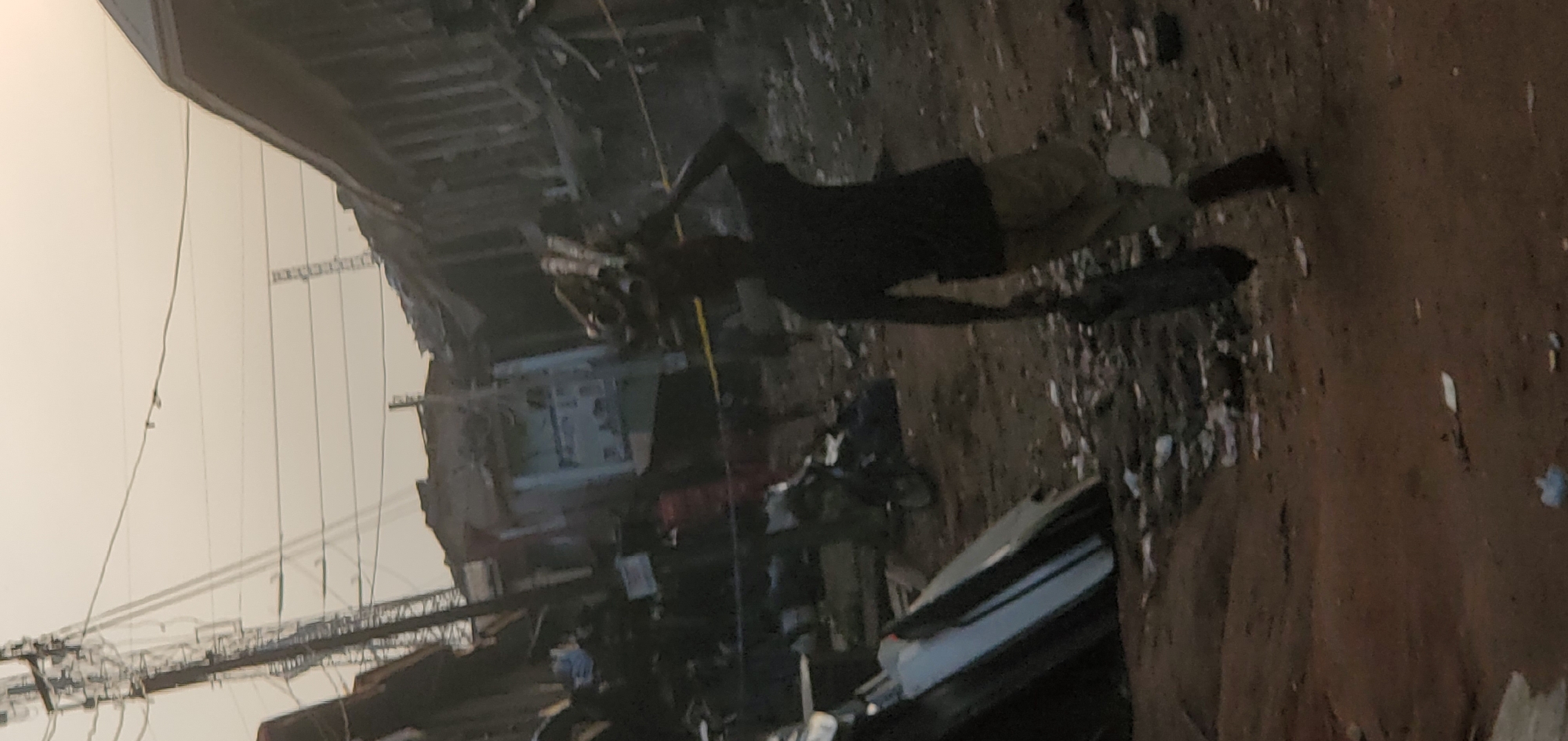 Debris-covered streets observed in Onitsha, Nigeria morning scene