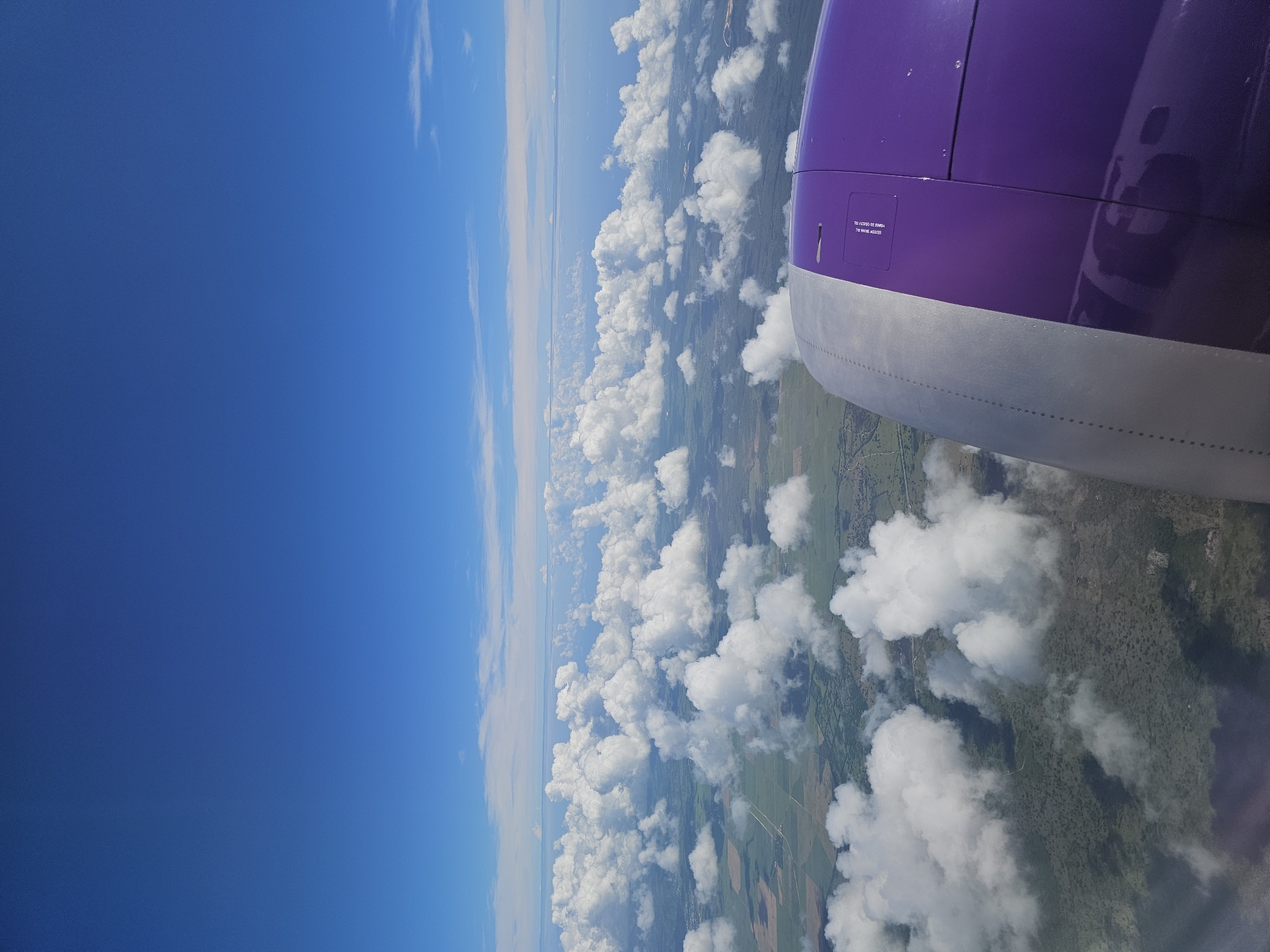Aircraft window view documented over Dominican Republic