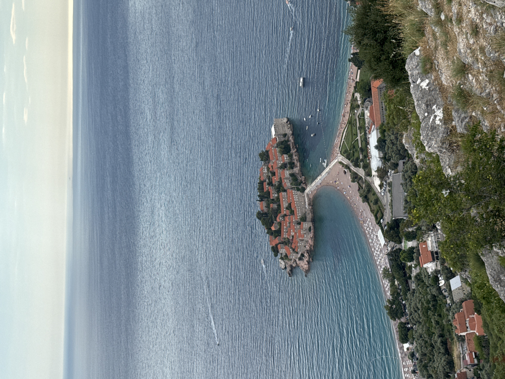 Sveti Stefan islet covered from every angle on a summer afternoon