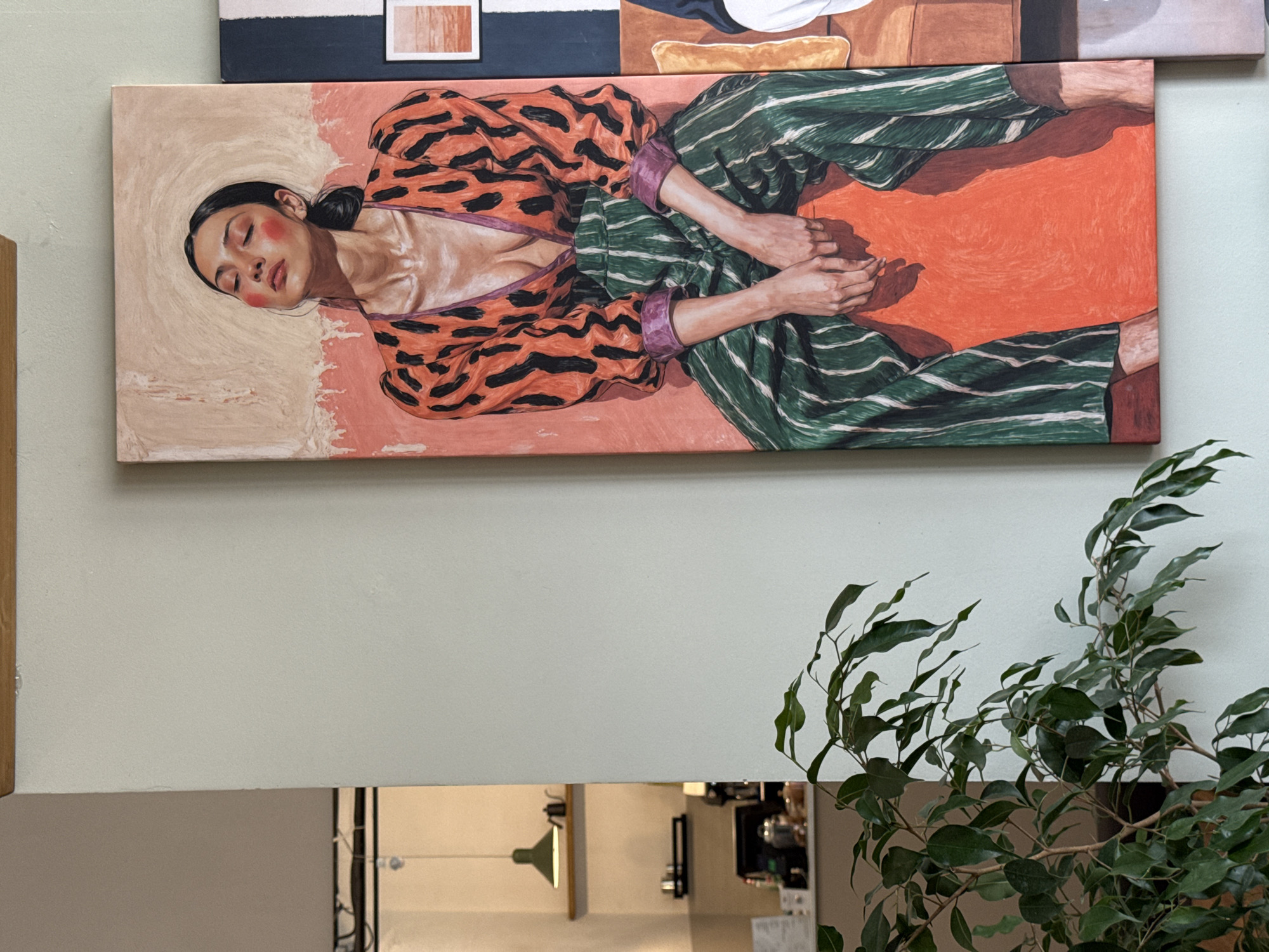 Moscow interior displays painting and bottled items observed