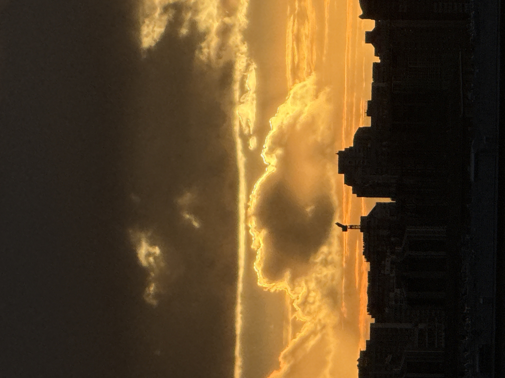 Evening sunset observed over Moscow cityscape with golden skies