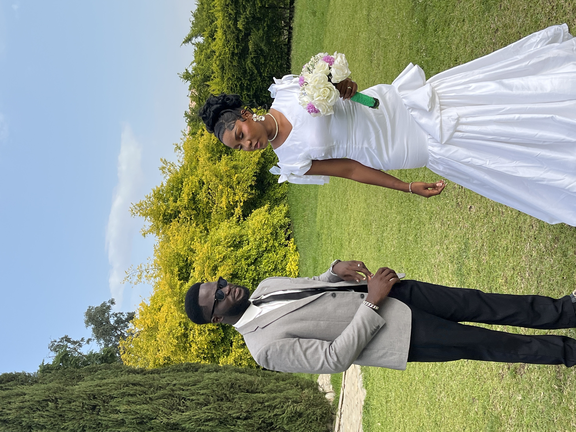 Wedding photoshoot on a sunny lawn in Bukuru, Nigeria
