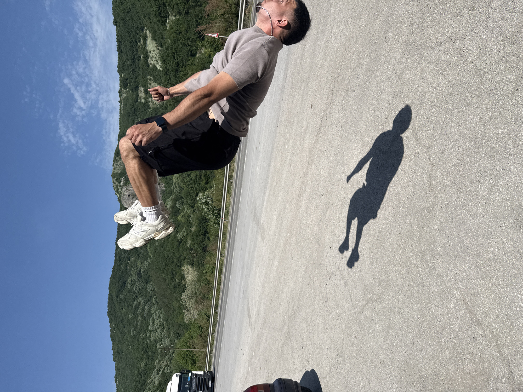 Man performs acrobatic stunts near roadside in Targovishte, Bulgaria