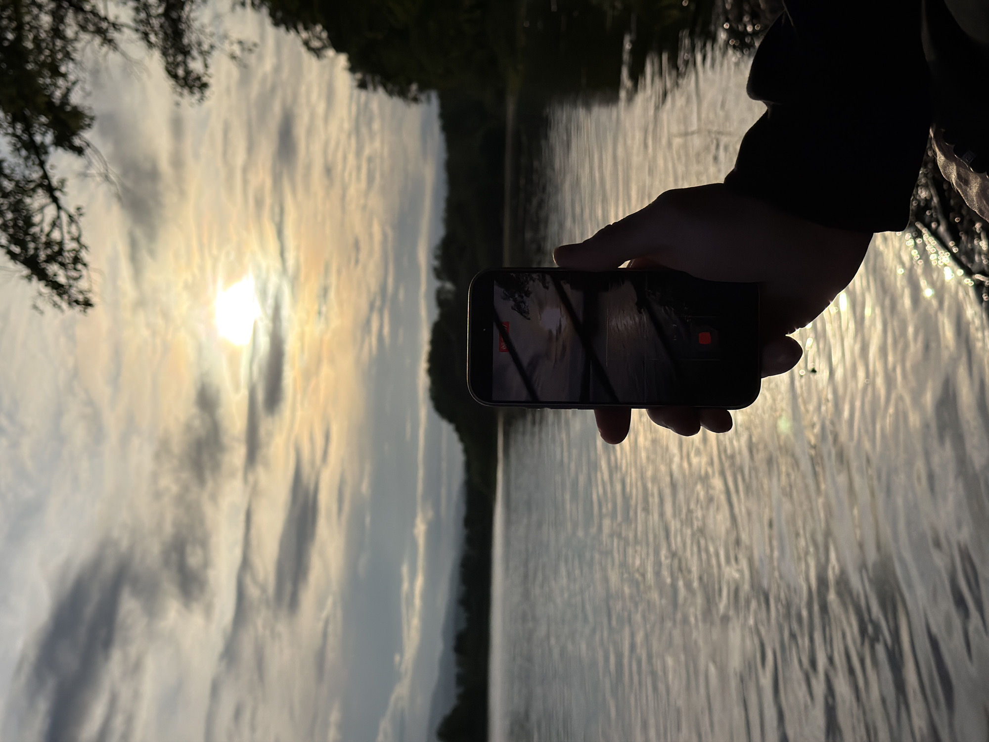 Golden hour riverside gathering documented in Birobidzhan, Russia