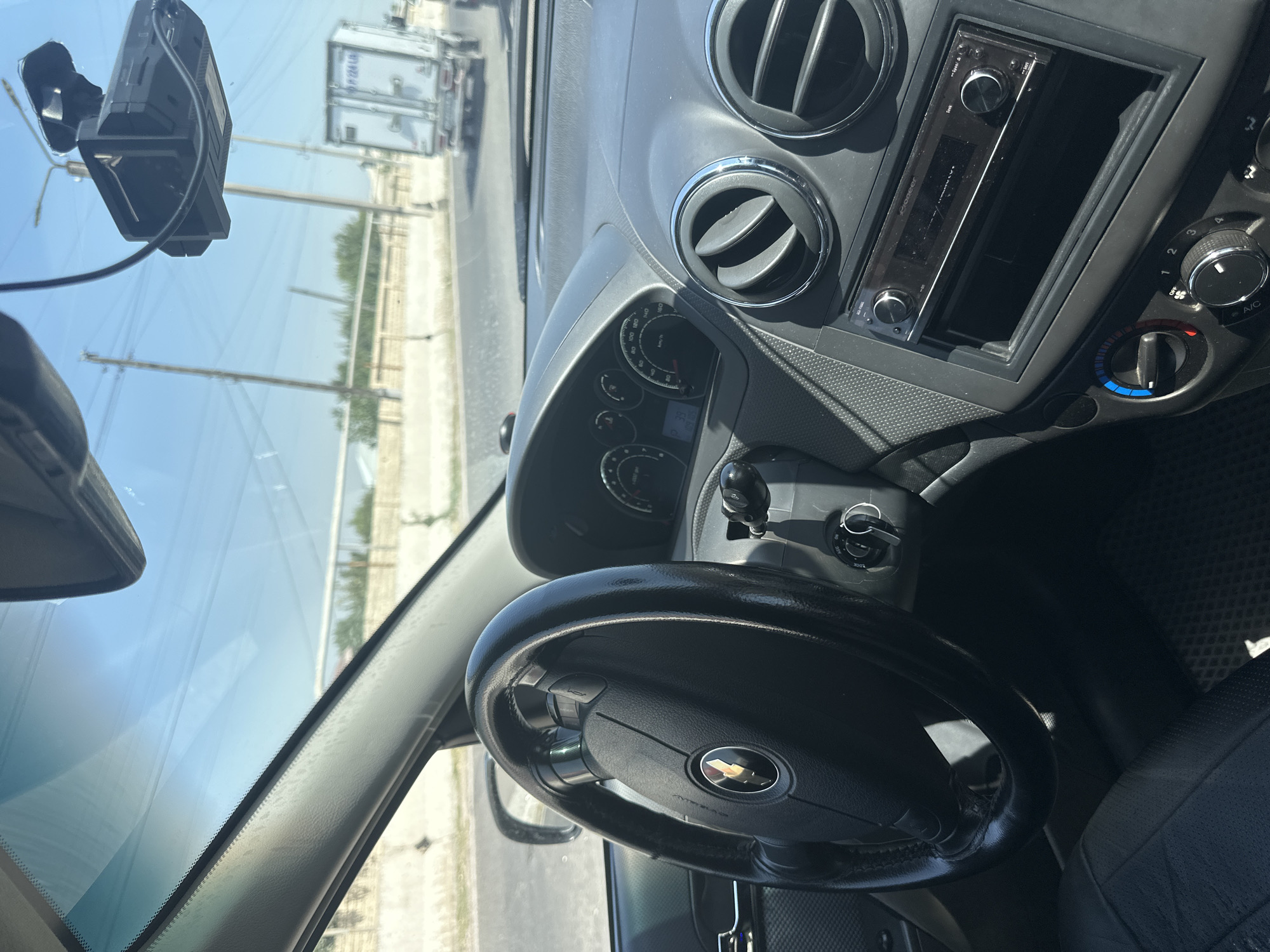 Cruising Tashkent streets in a Chevrolet on a sunny morning
