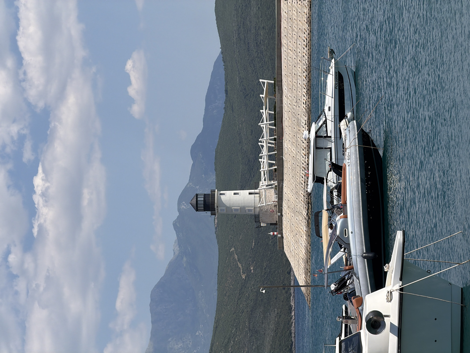 Radovići marina and waterfront on a clear Adriatic afternoon