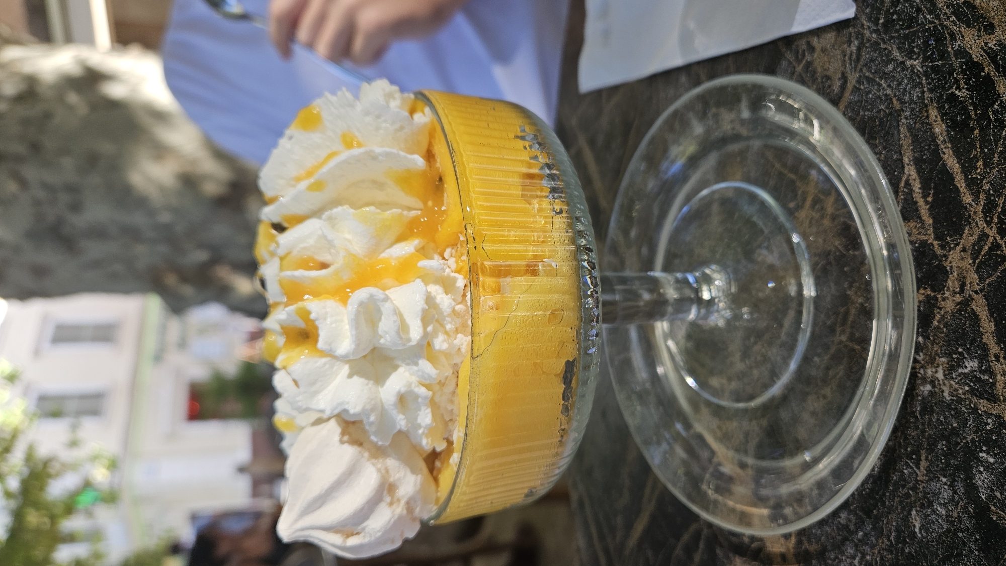 Terrace drinks and dessert with a Corsican coastal backdrop