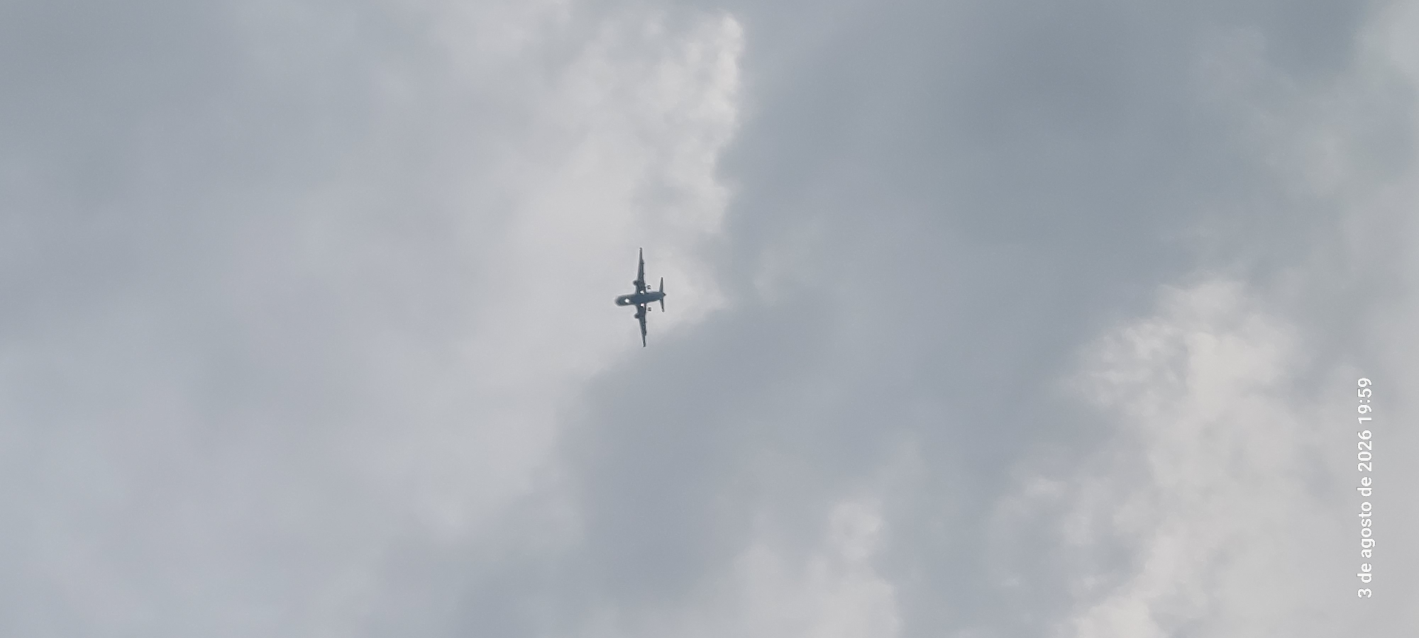 Overcast afternoon at Castelldefels beach with planes passing overhead