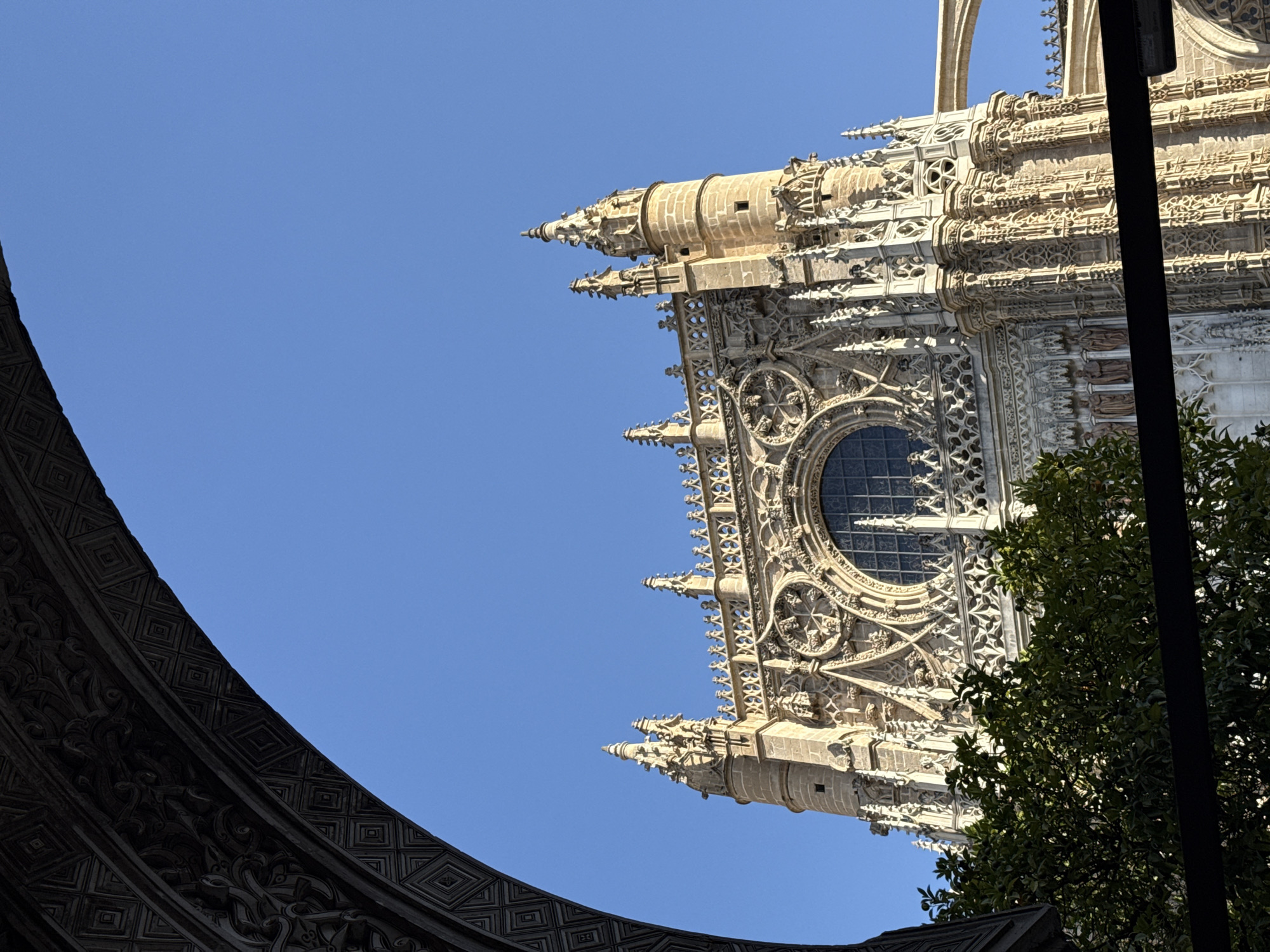 Exploring Seville Cathedral's Gothic details on a sunny afternoon