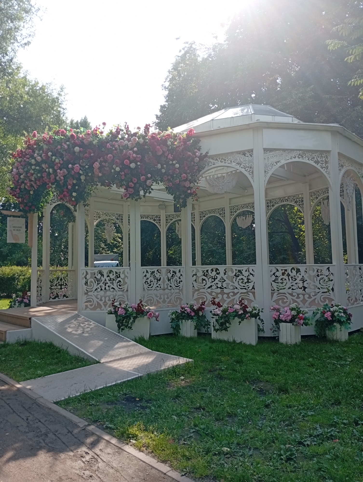 Moscow park in peak summer bloom, roses and florals everywhere