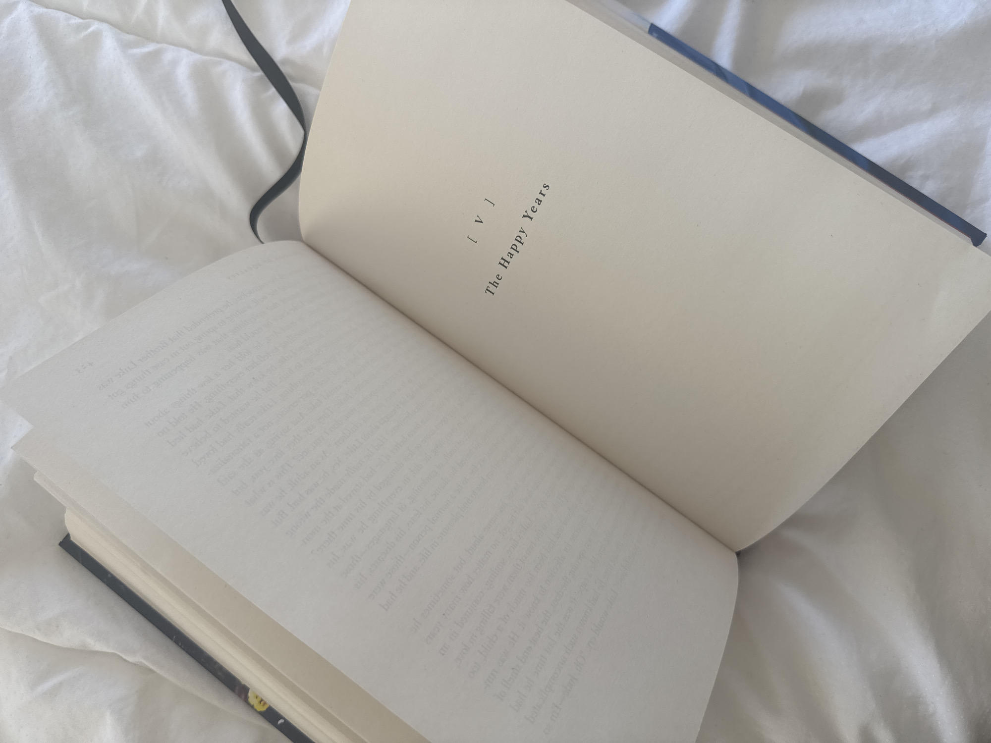 Open book shows 'Happy Years' chapter on London bedding