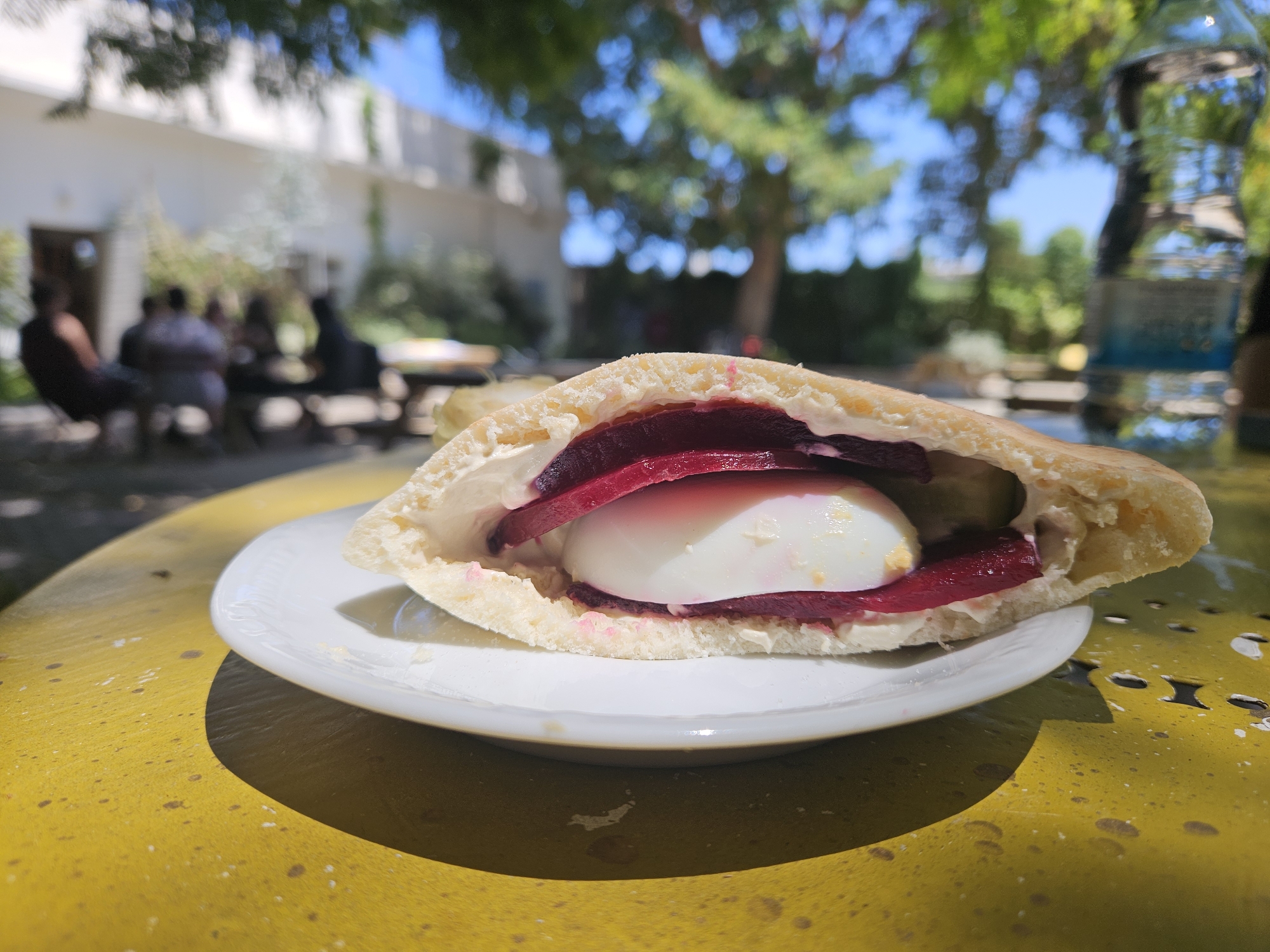 A slow Tel Aviv morning in a shaded urban courtyard