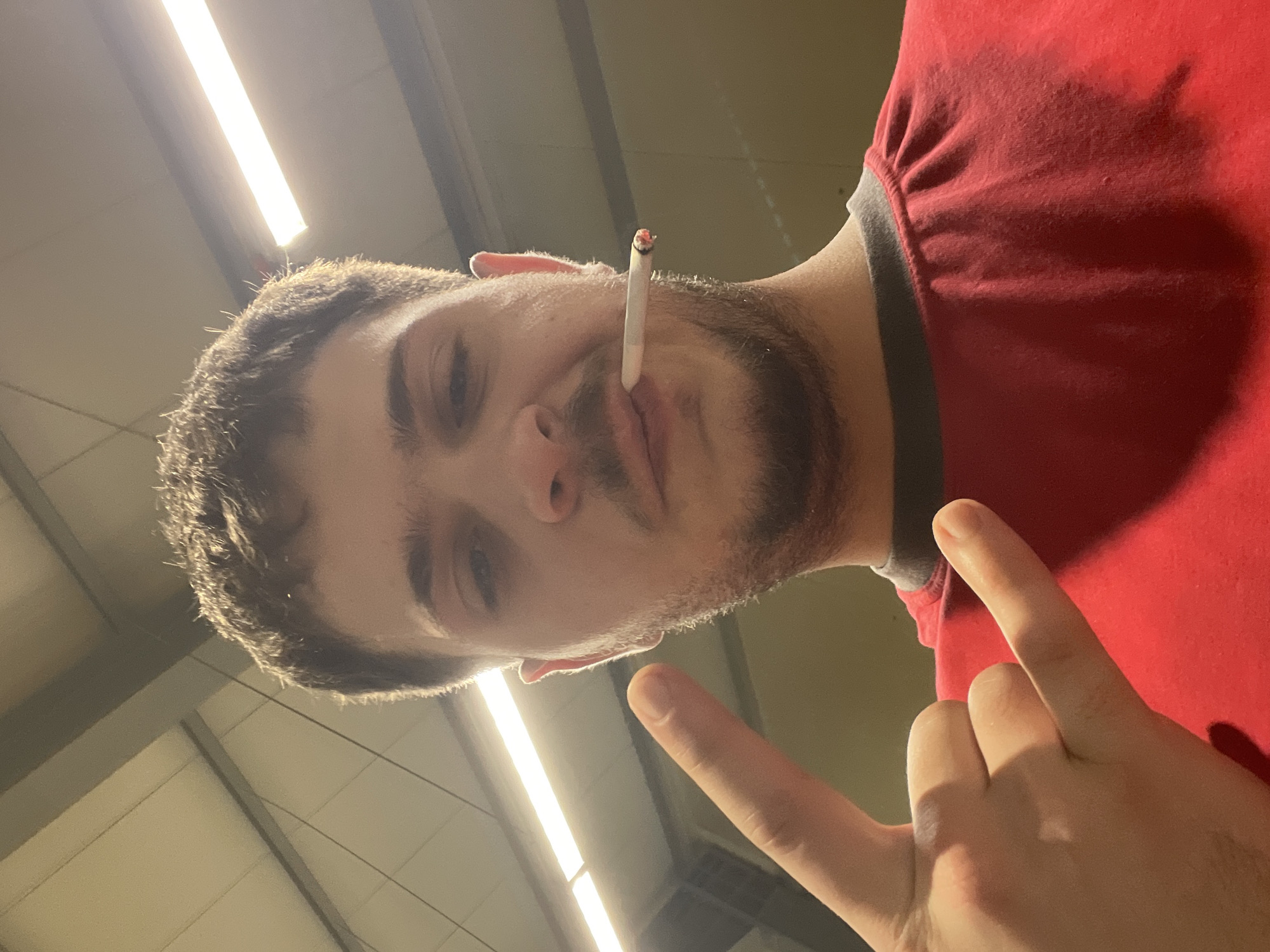 Person makes peace sign while smoking in Lyaskovets