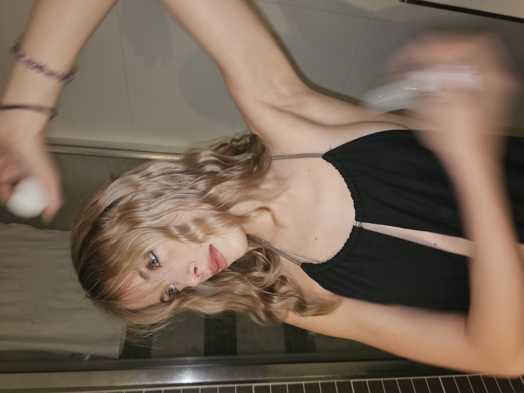 Woman photographed in bathroom setting in Pantin, France