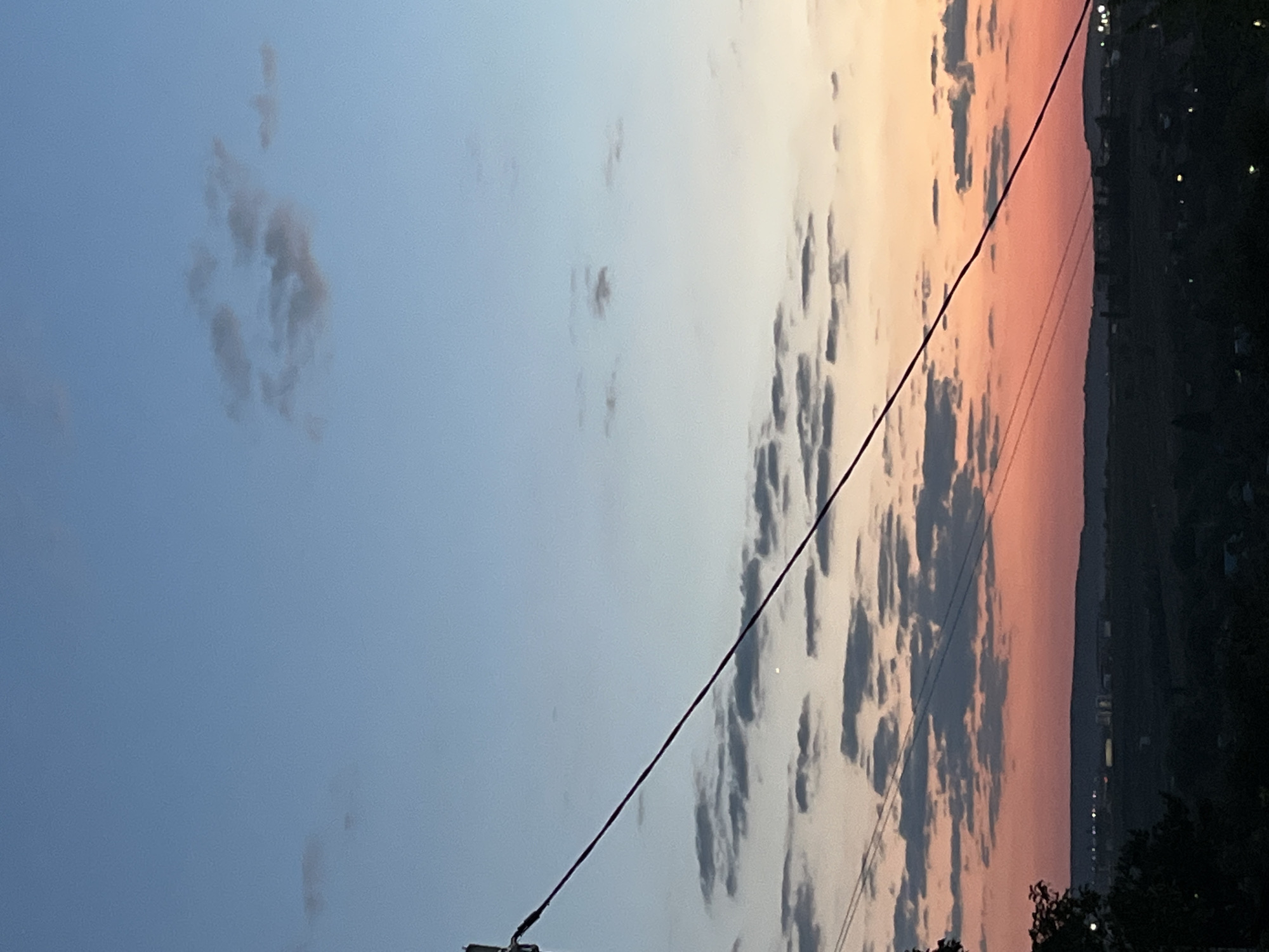 Dusk settles over Saratov in a sweep of orange and pink