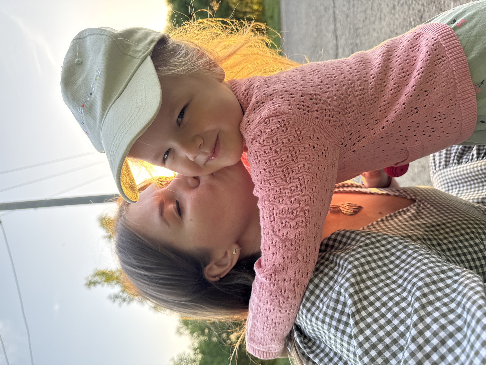 Mother and child enjoy evening moments in Russian town
