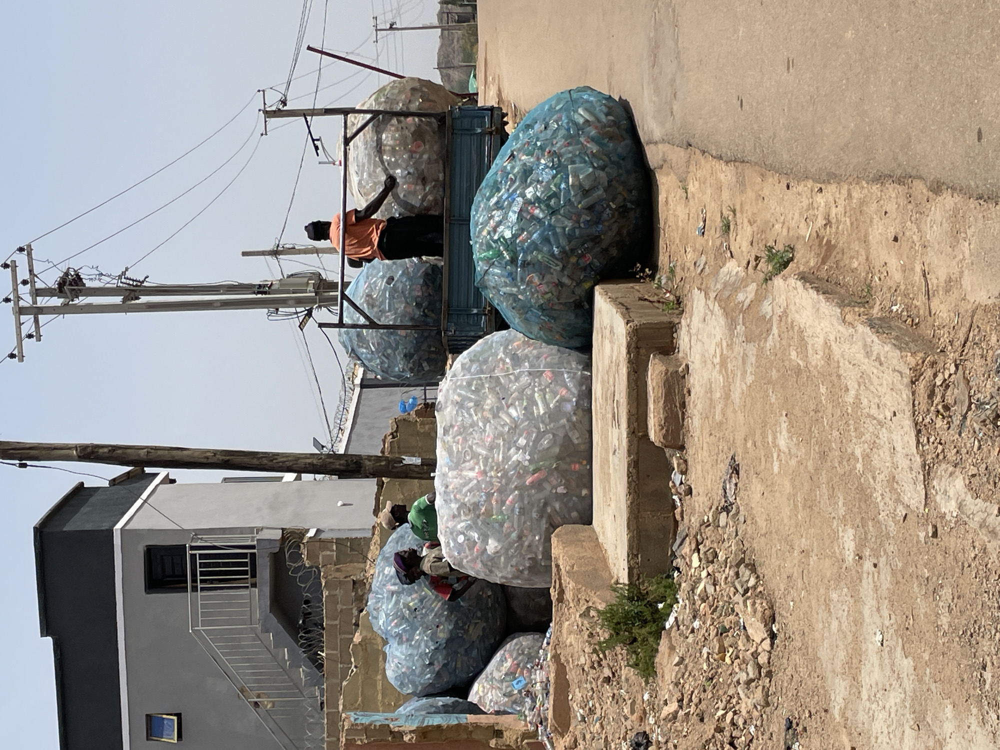 Daily life documented across Jos, Nigeria streets and commercial areas