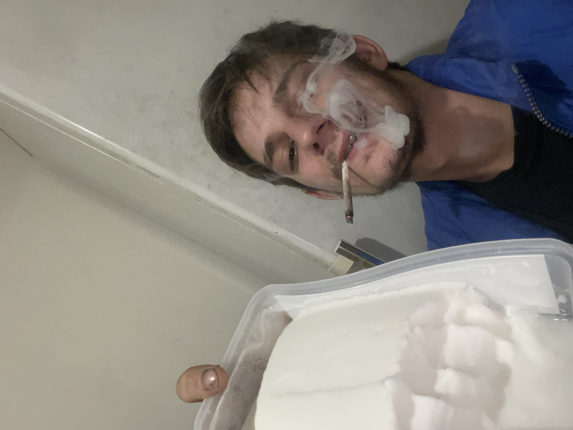 Man documented smoking marijuana, handling substances at unknown location