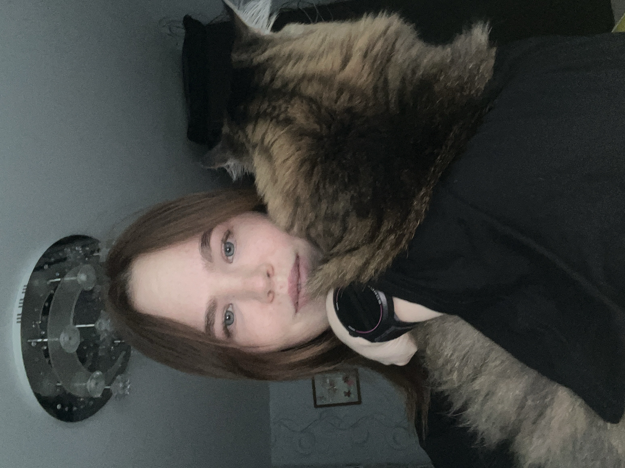 Woman documents afternoon in Chaikovsky with selfies, cat, child