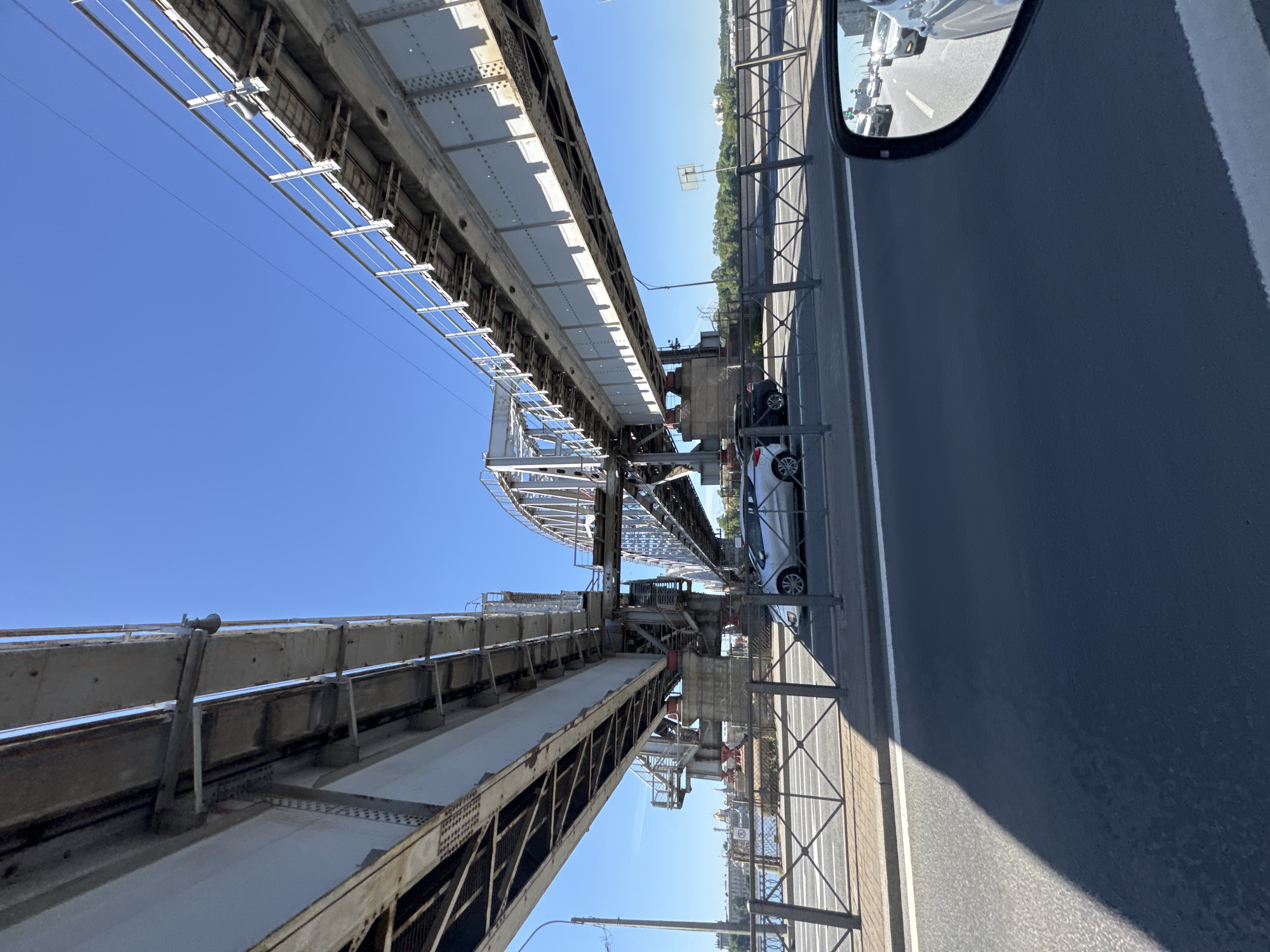 Driving past Saint Petersburg's Neva River bridges on a sunny morning