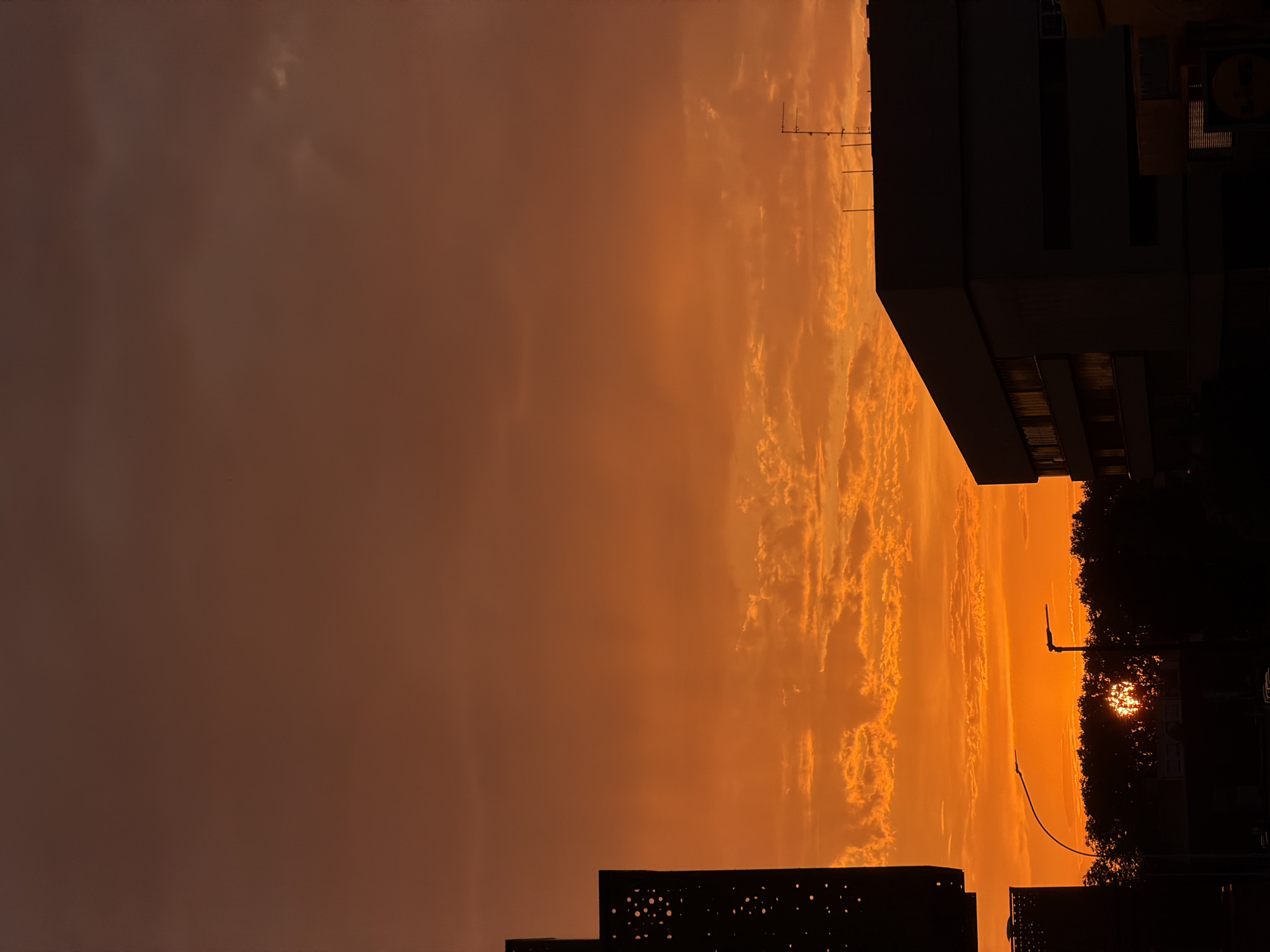 Strasbourg skyline glows orange in a striking summer sunset
