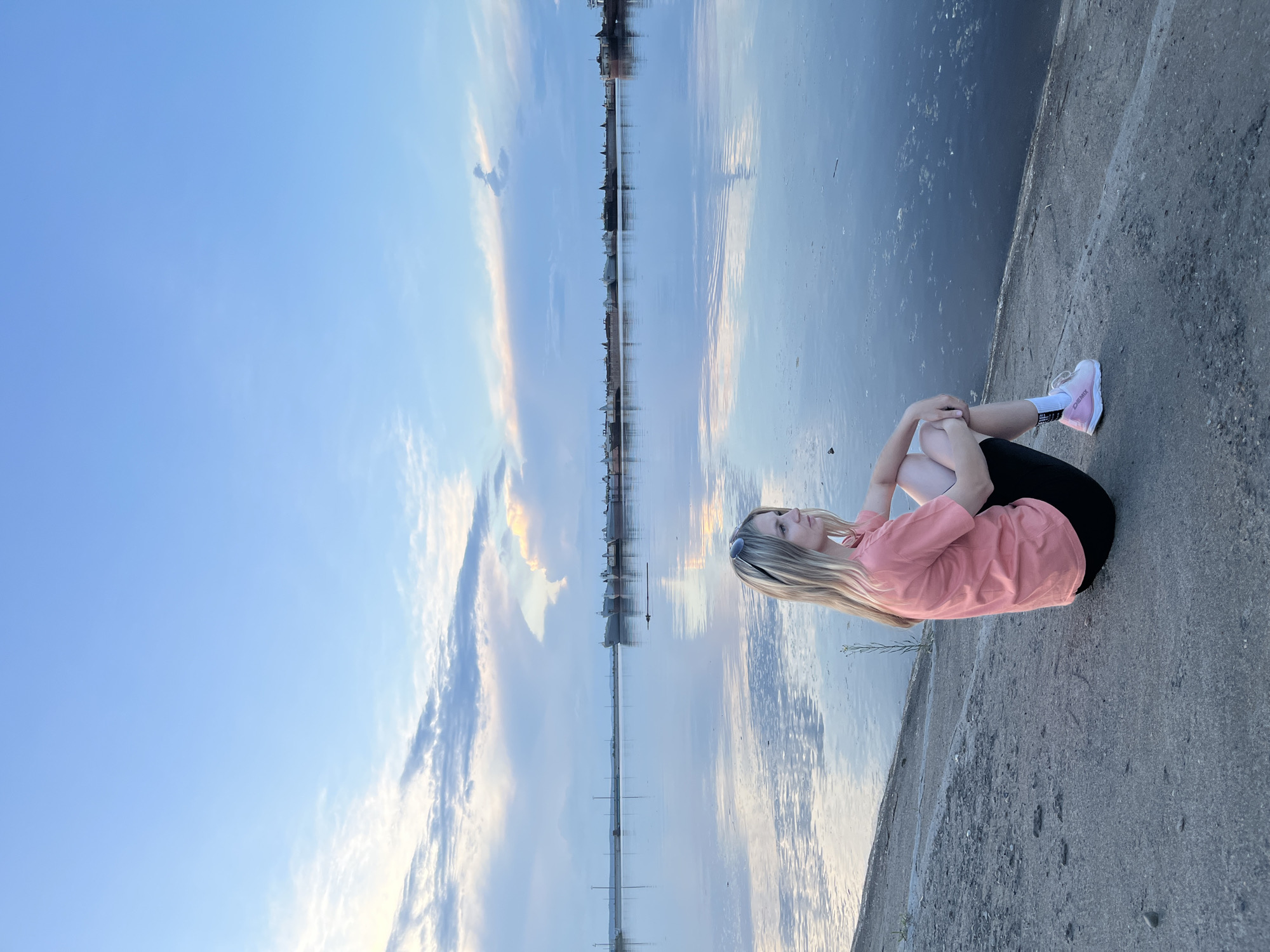 Evening leisure activities captured along Chaikovsky waterfront during sunset