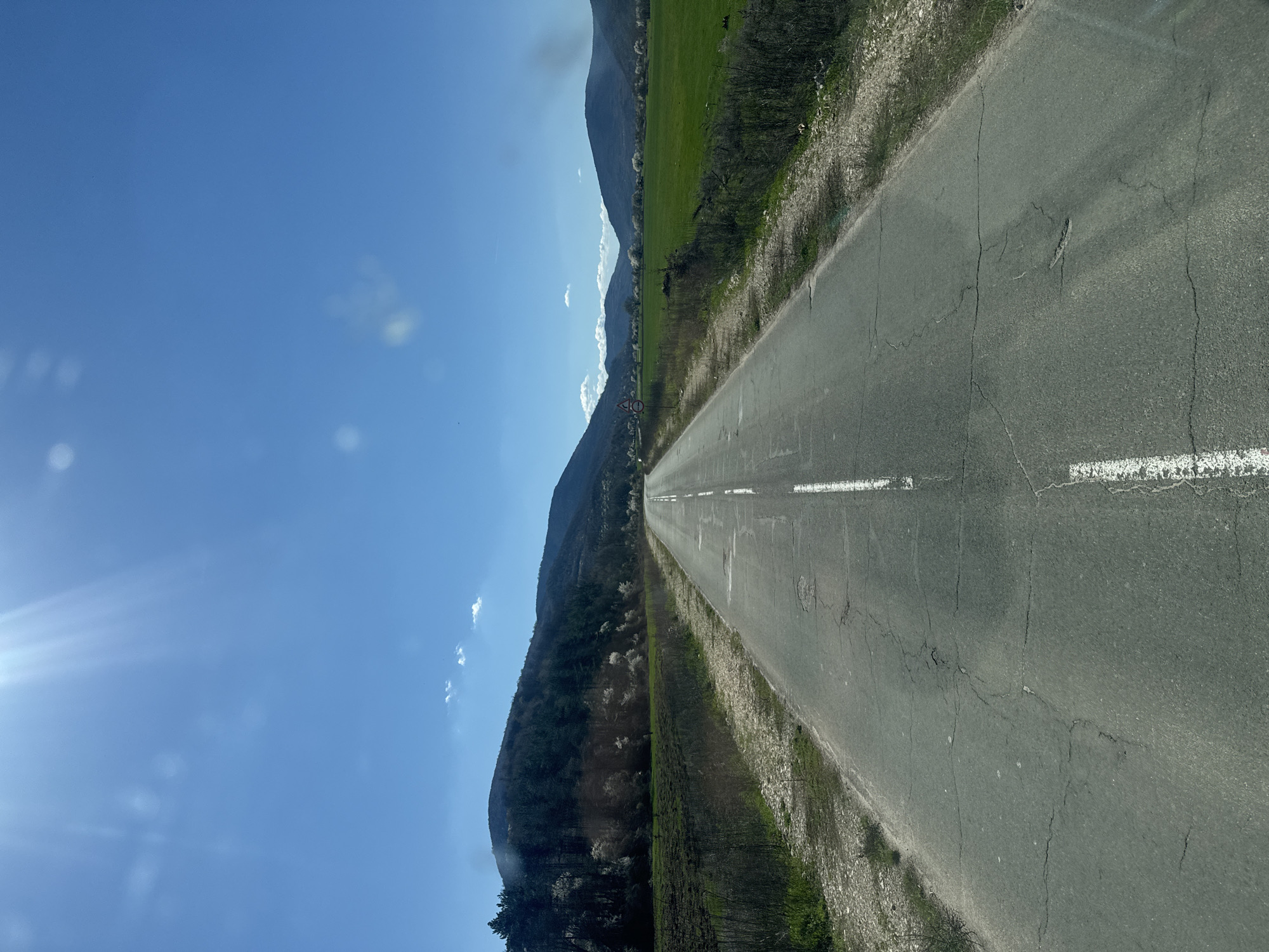 Cracked rural road documented near Glozhene, Bulgaria
