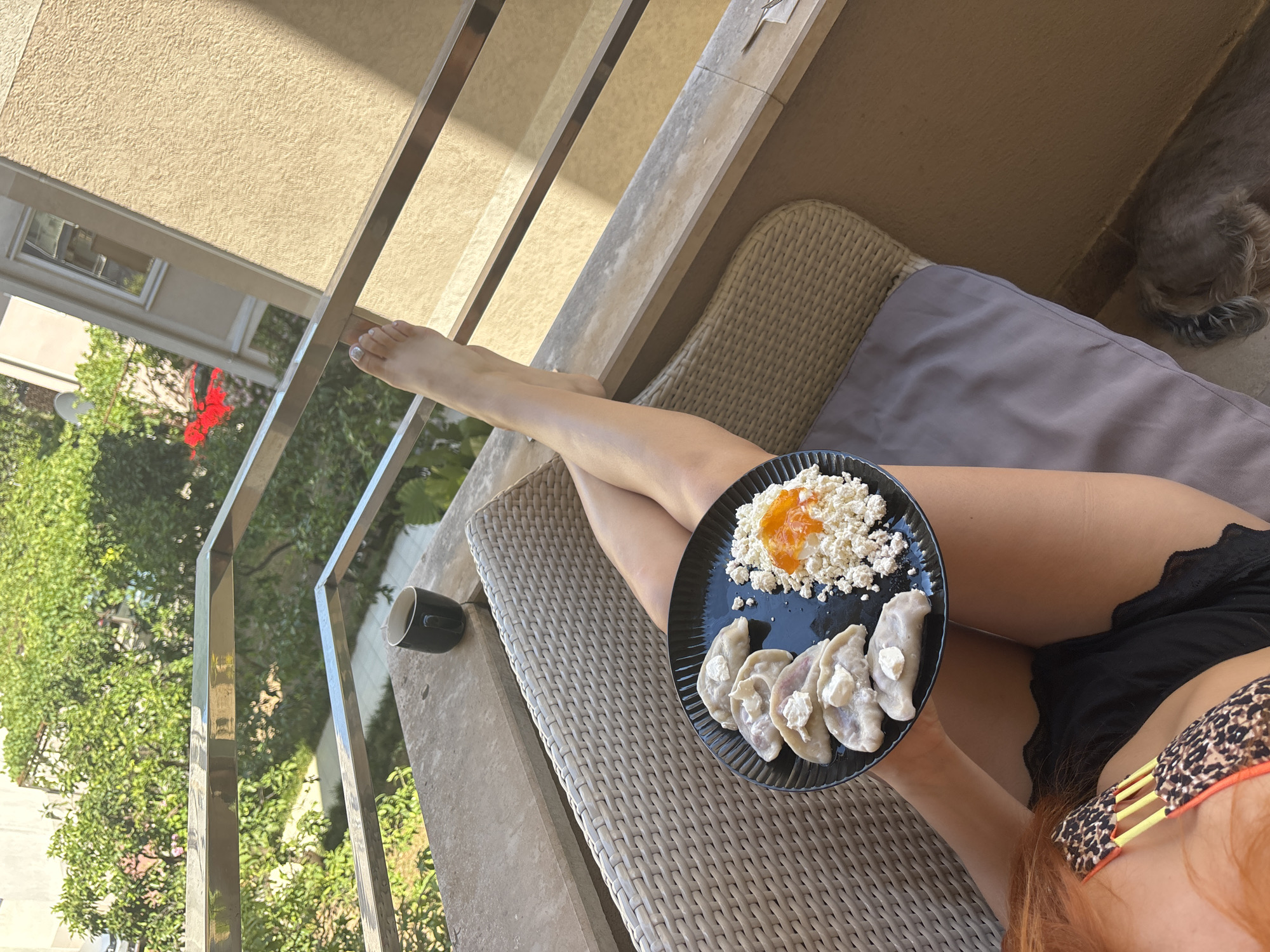 Balcony breakfast in Budva: pierogi, cottage cheese, and a view
