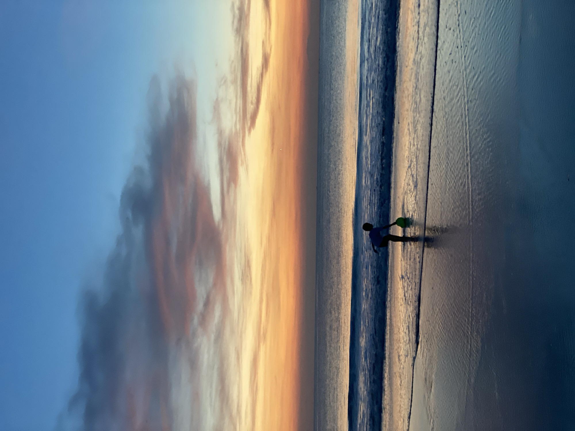 Sunset beach activities and dining captured in Kuta Selatan