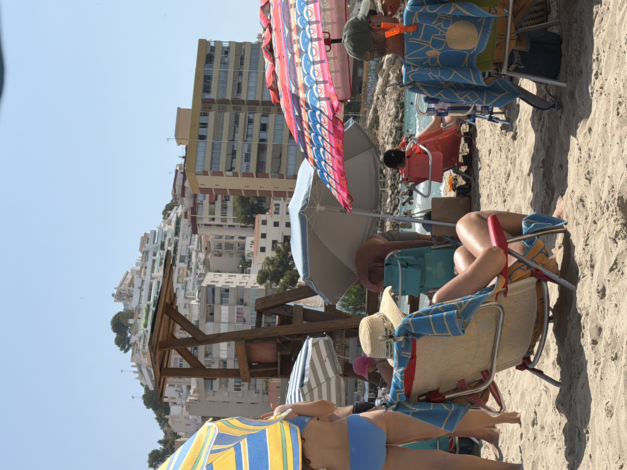 Lazy summer morning on a crowded Costa Blanca beach