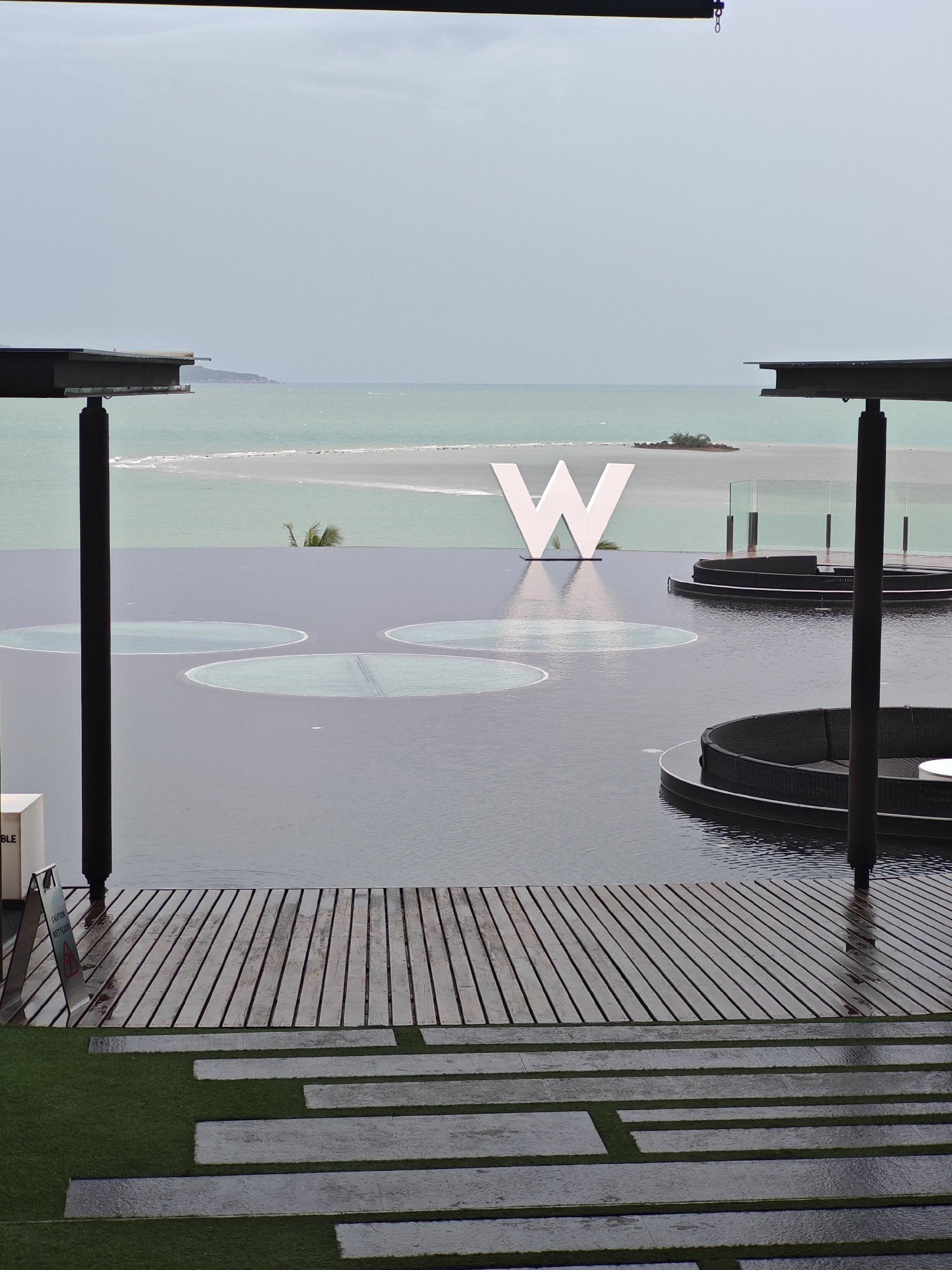 W Koh Samui's infinity pool and ocean-facing sculpture