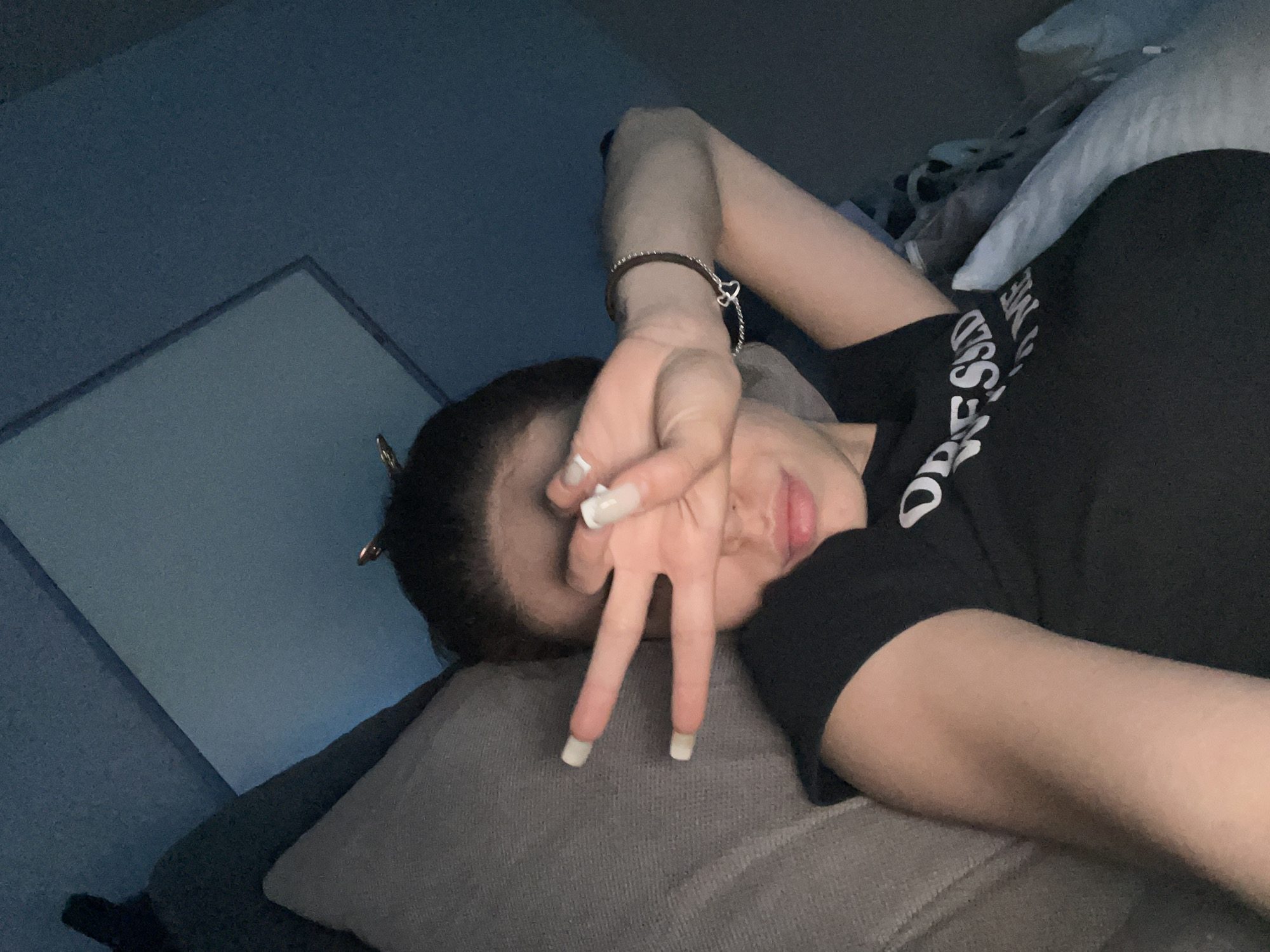 Lazy evening selfie session with recurring tattoos and graphic tees