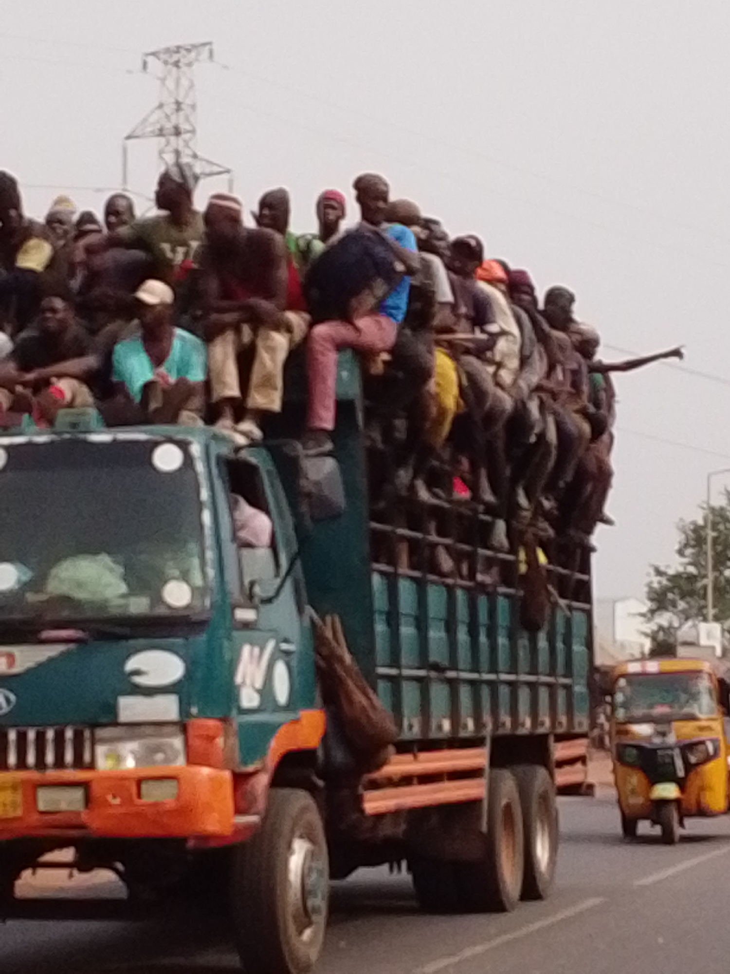Overloaded passenger truck, construction activity observed in Tamale