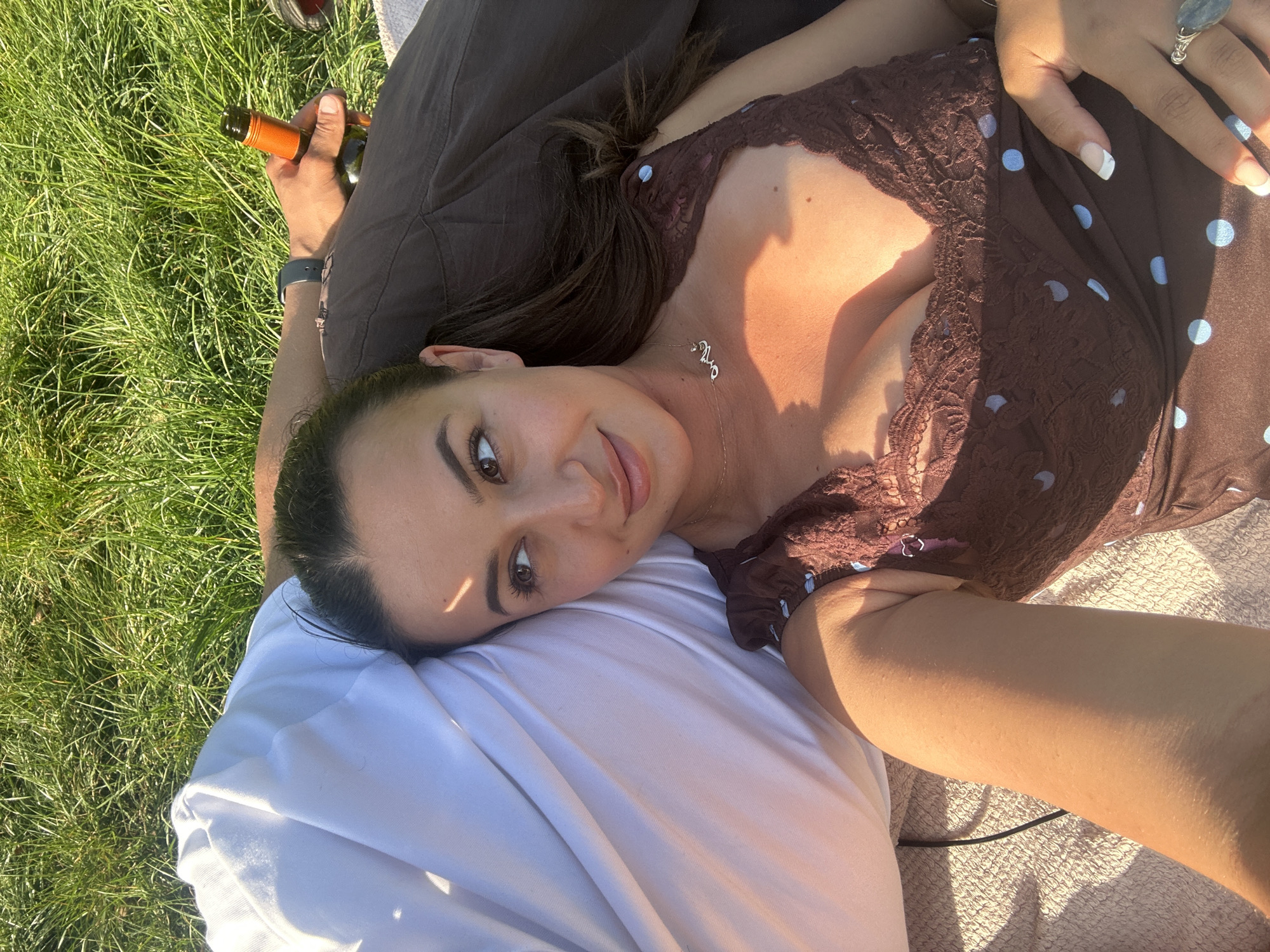 Couple spotted relaxing on blanket in London park