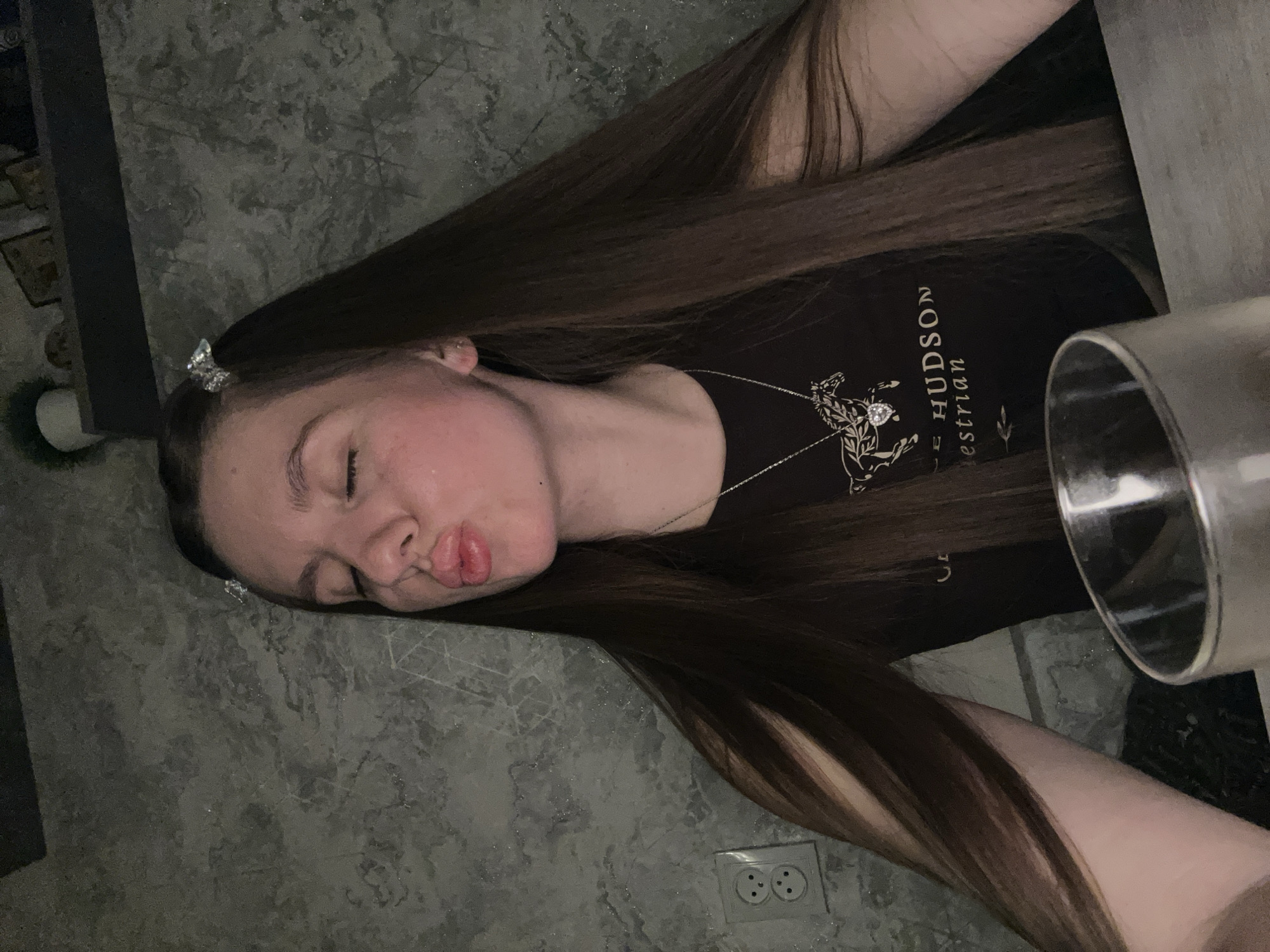 Woman spends evening indoors in Klin, Russia