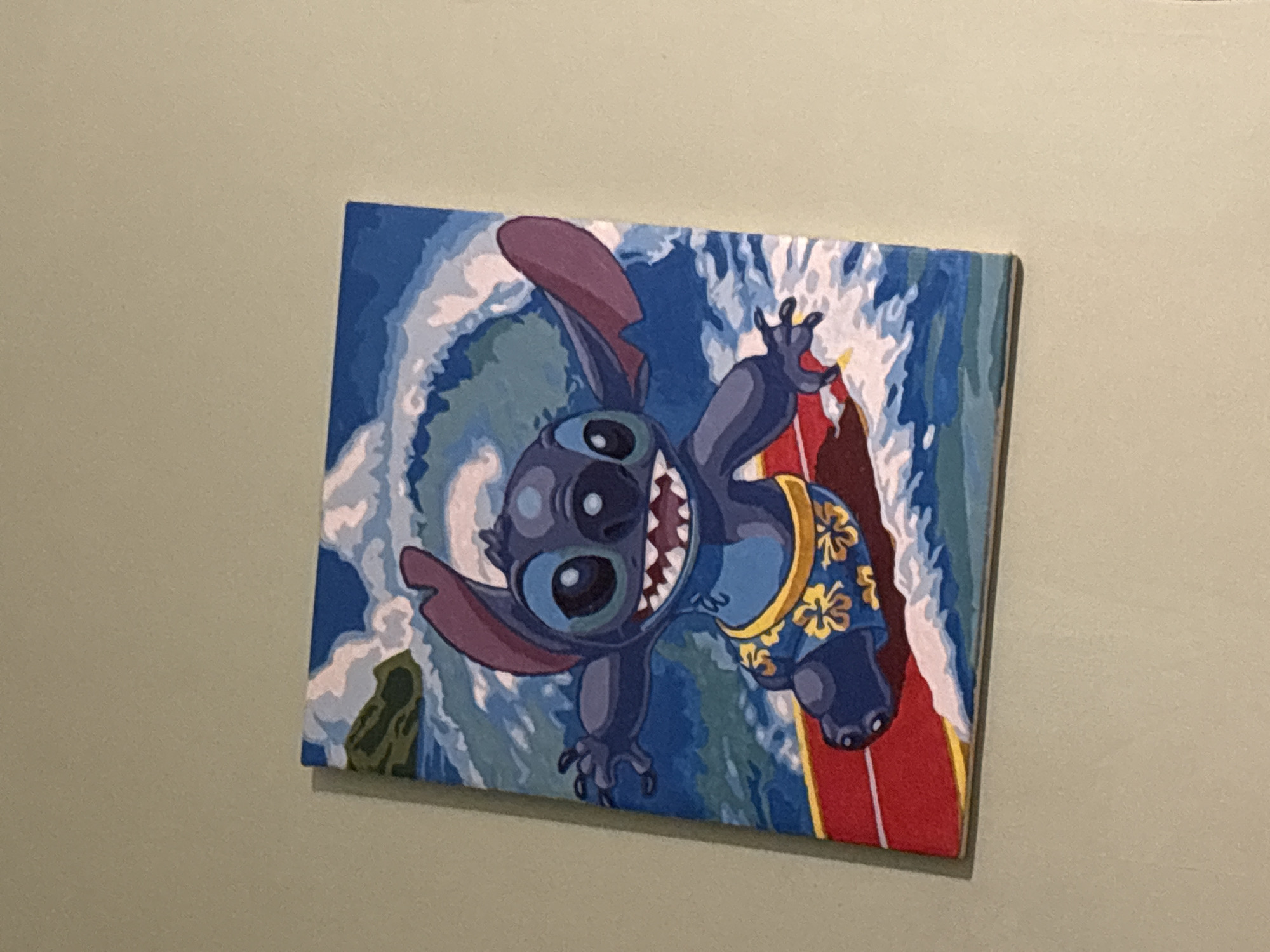 Person resting indoors with Disney decor captured in Russia