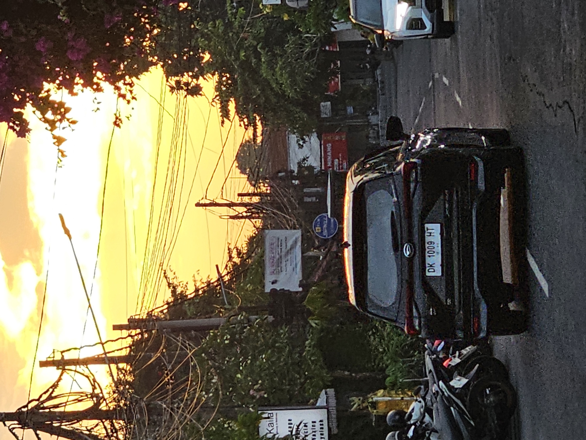 Evening scenes capture daily life across Denpasar during golden hour