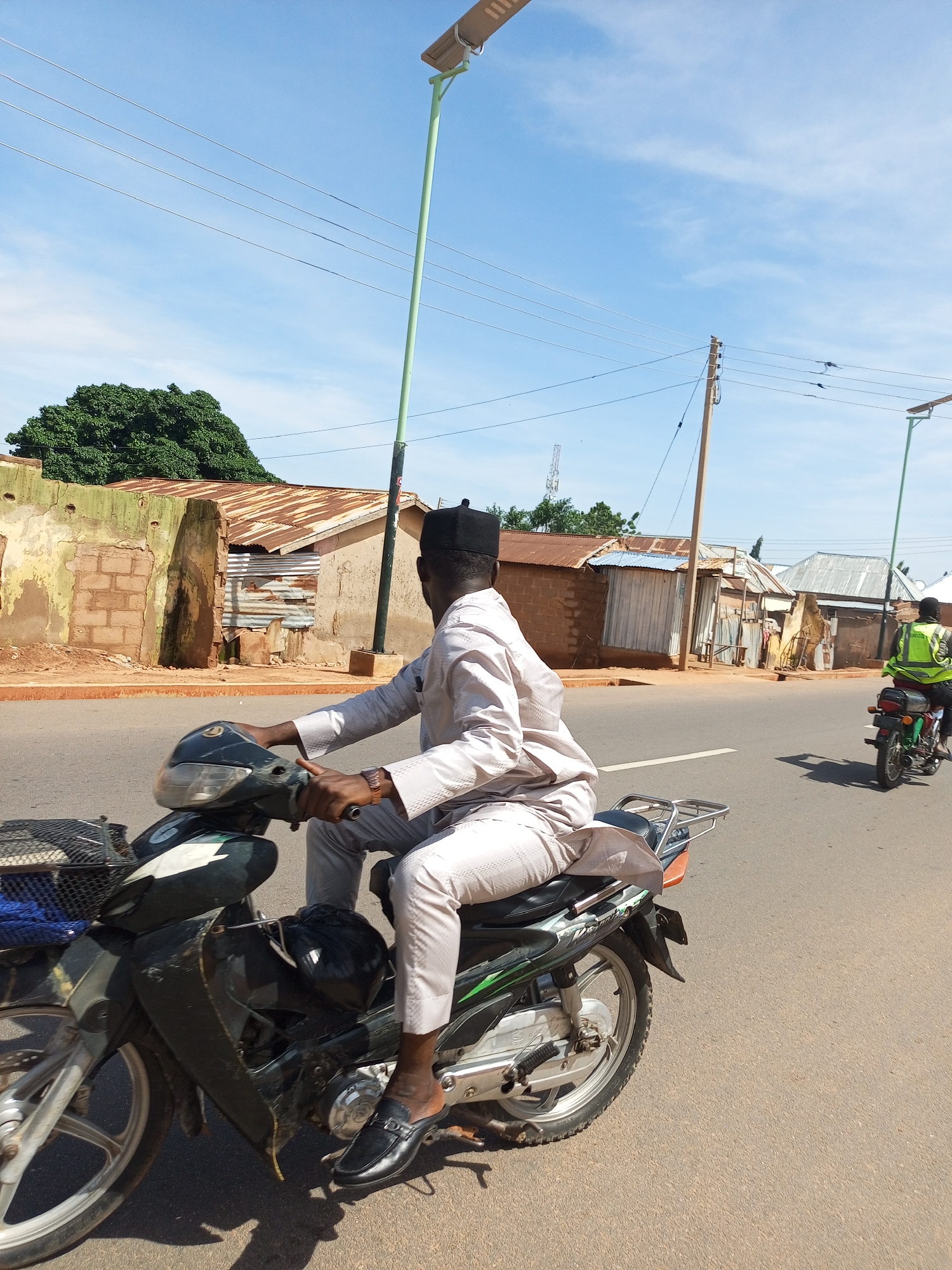 Morning street activity in Arawa, Nigeria