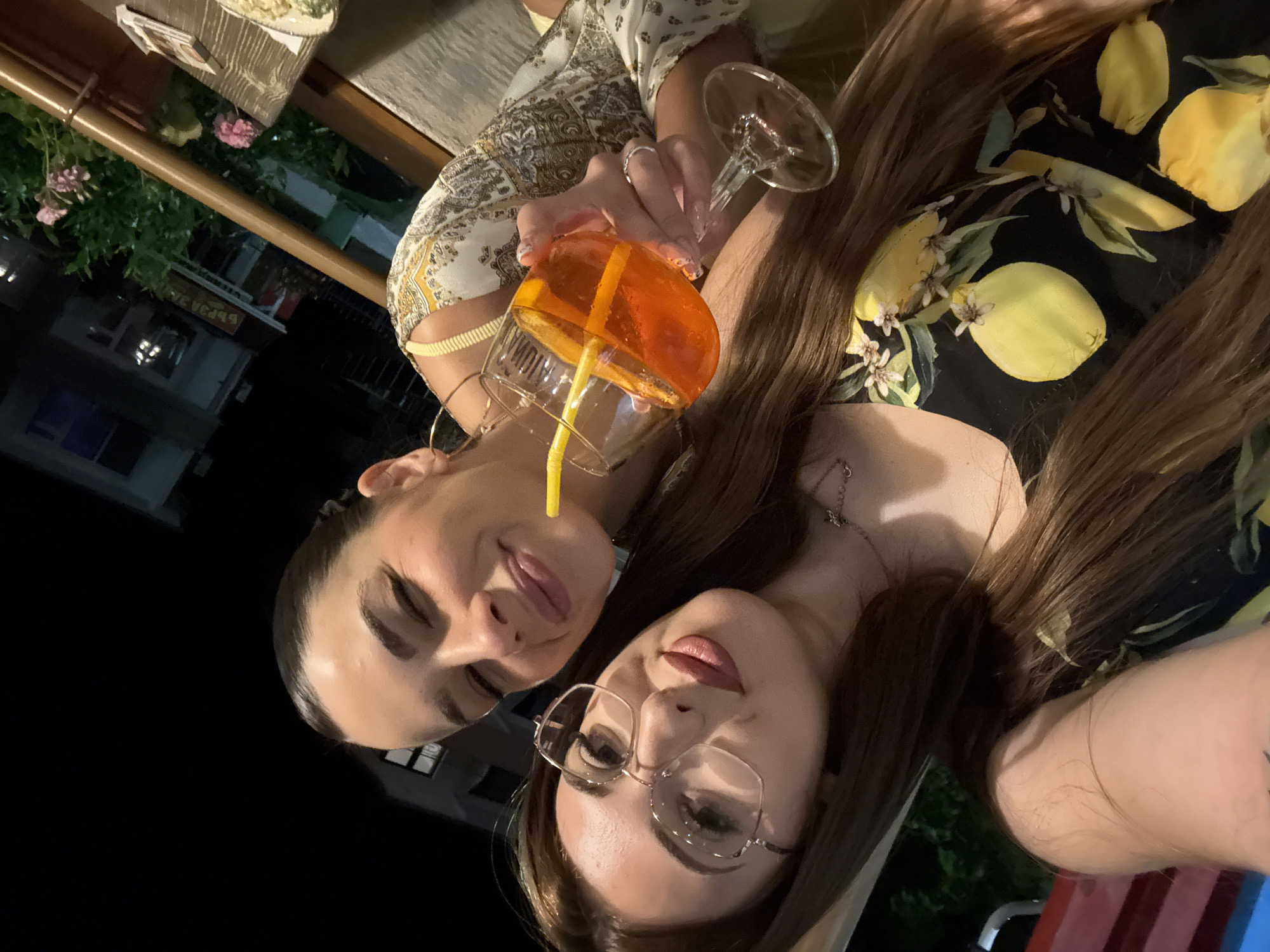Two women enjoy dinner and drinks at Ravda restaurant
