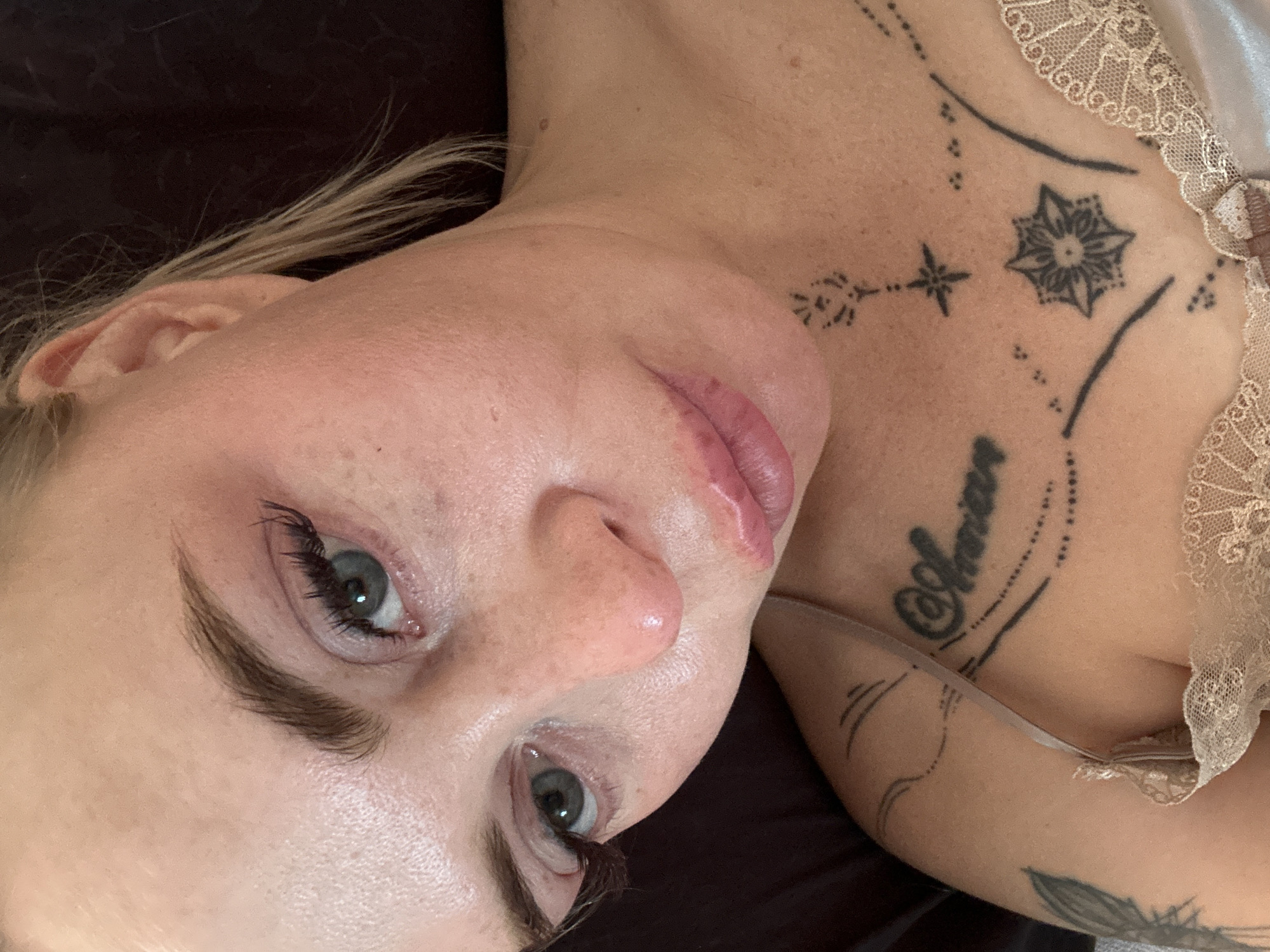 Blonde Woman Photographed in Multiple Close-Up Indoor Shots