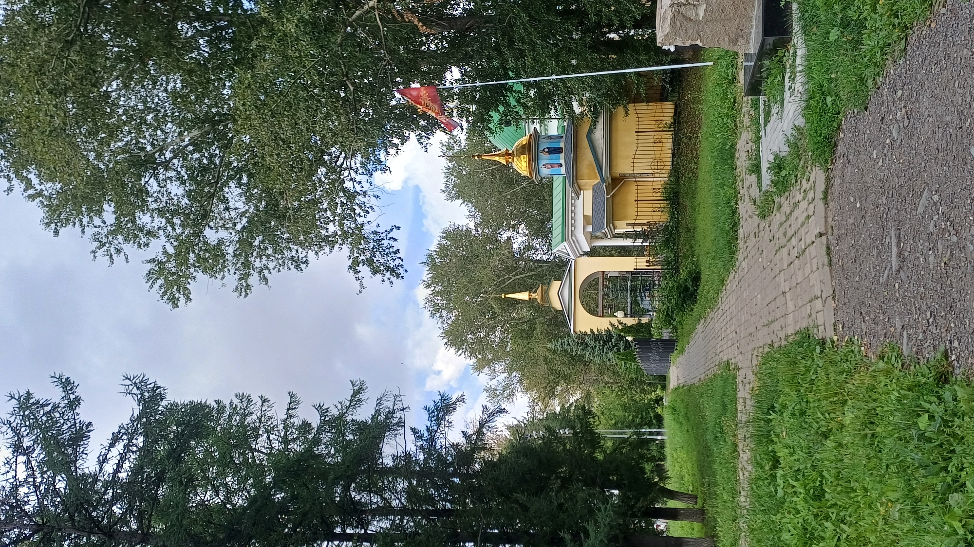 Summer morning in an Izhevsk park near a landmark church