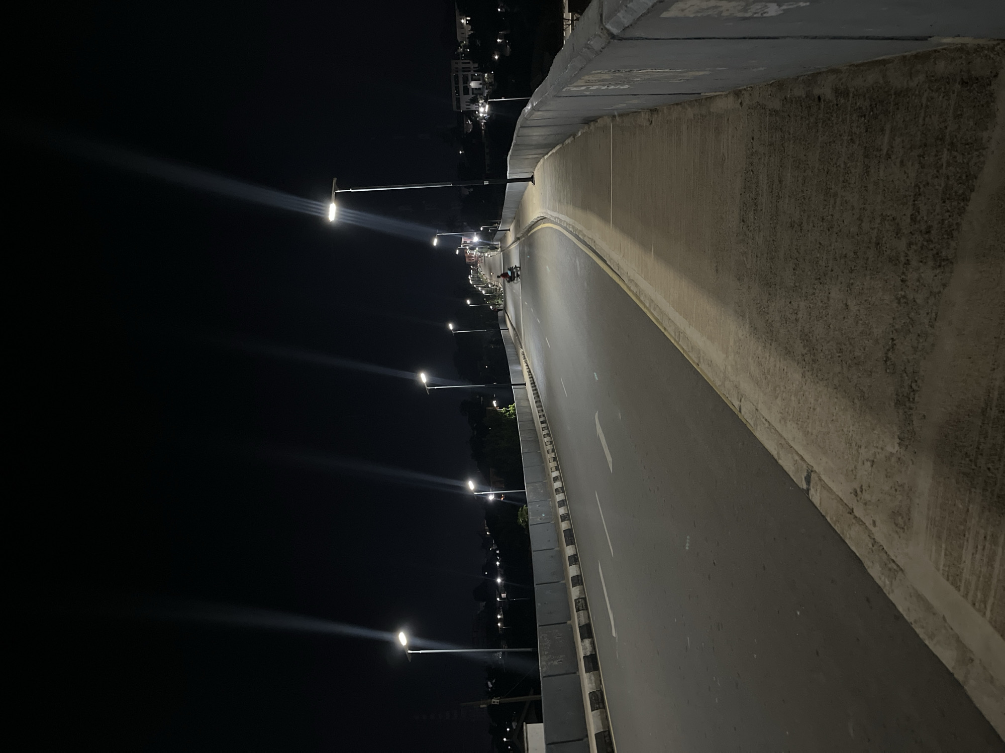 Evening bridge crossing captured in Jos, Nigeria