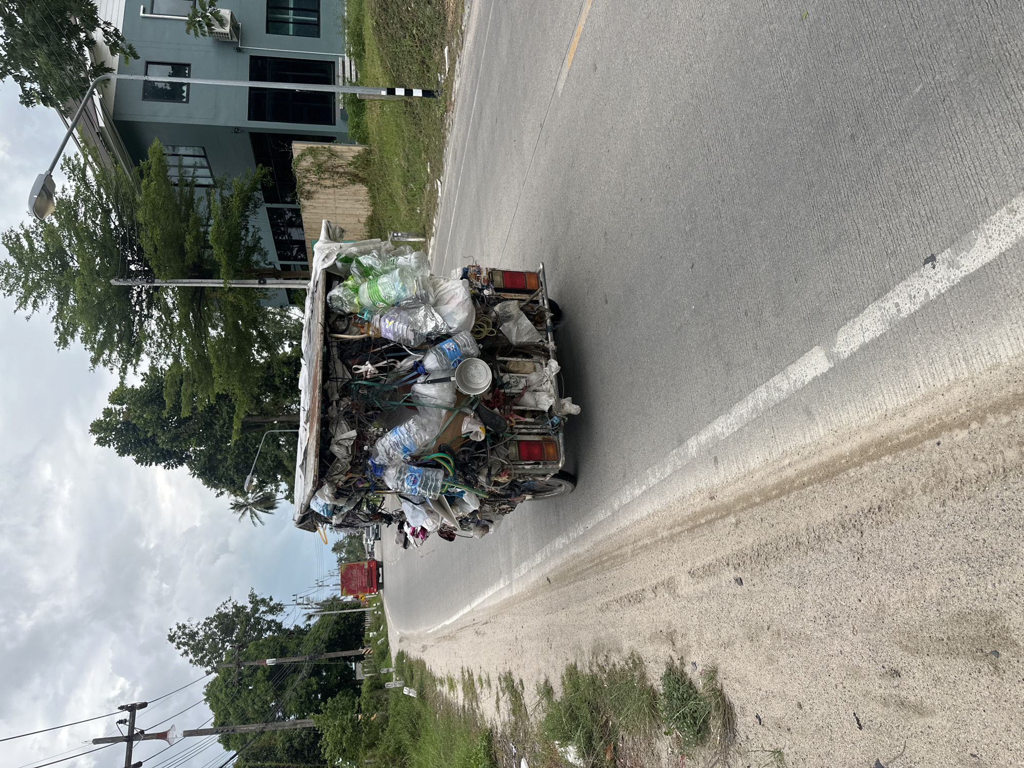 Overloaded three-wheeler spotted on Koh Phangan road