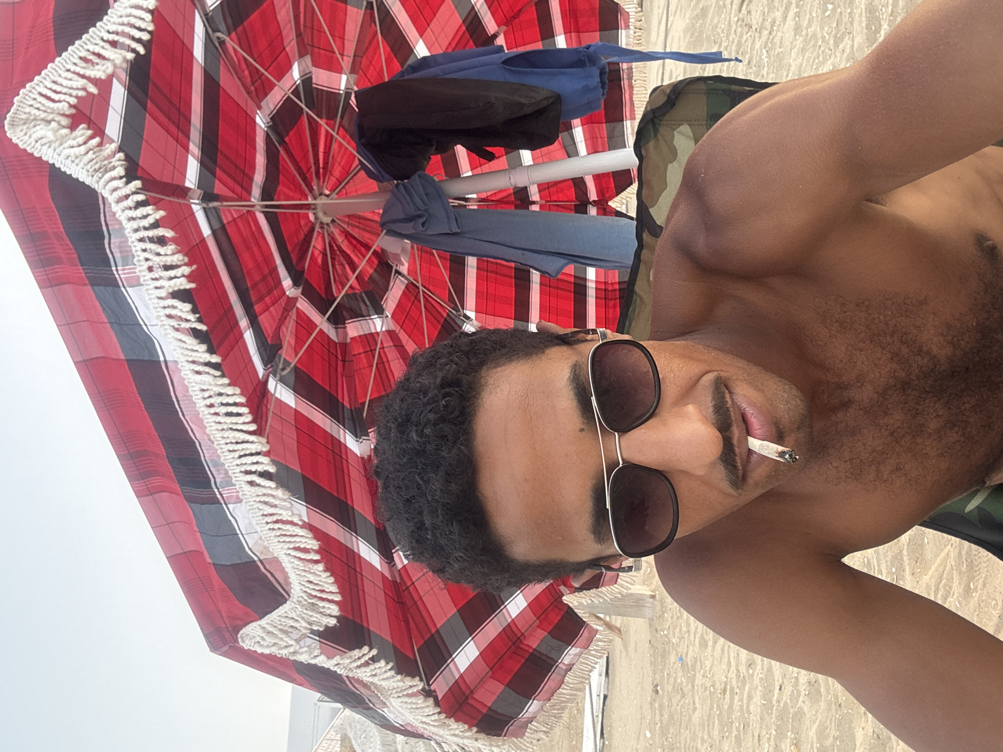 Lazy summer afternoon on the beach in M'Diq, Morocco