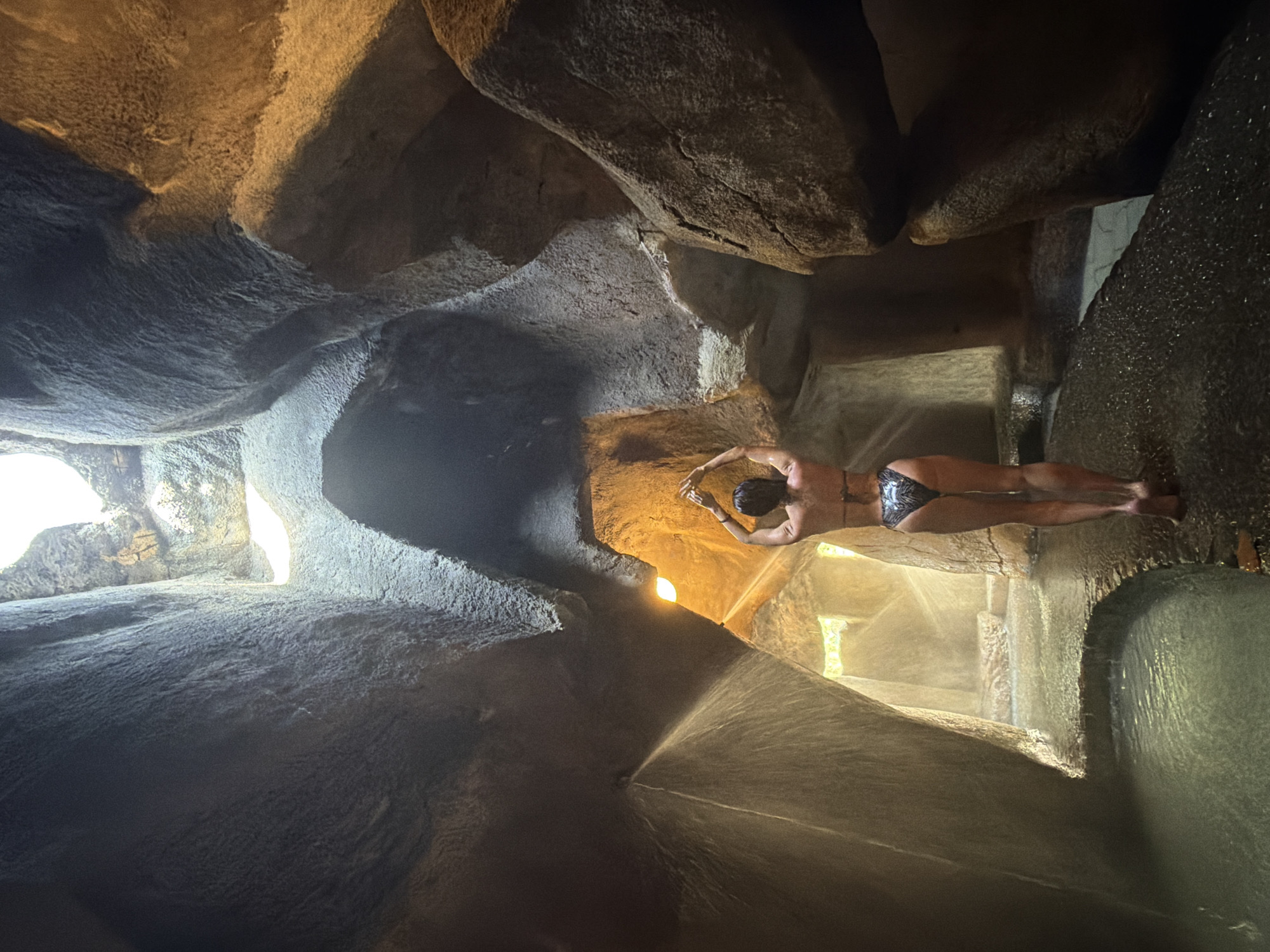 Tourist explores natural grotto in Nha Trang, Vietnam